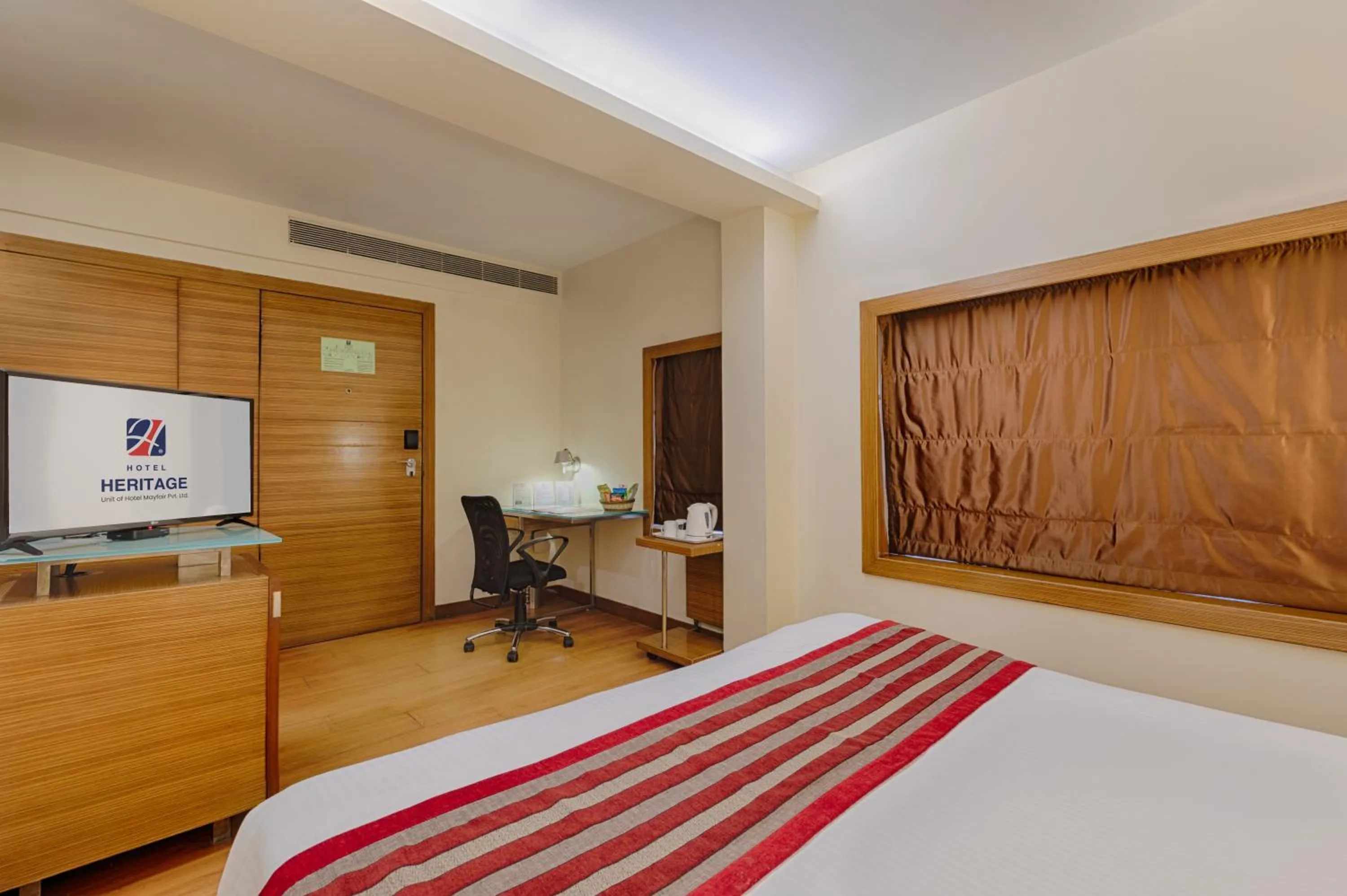 Bed in Hotel Heritage formerly known as Comfort Inn Heritage