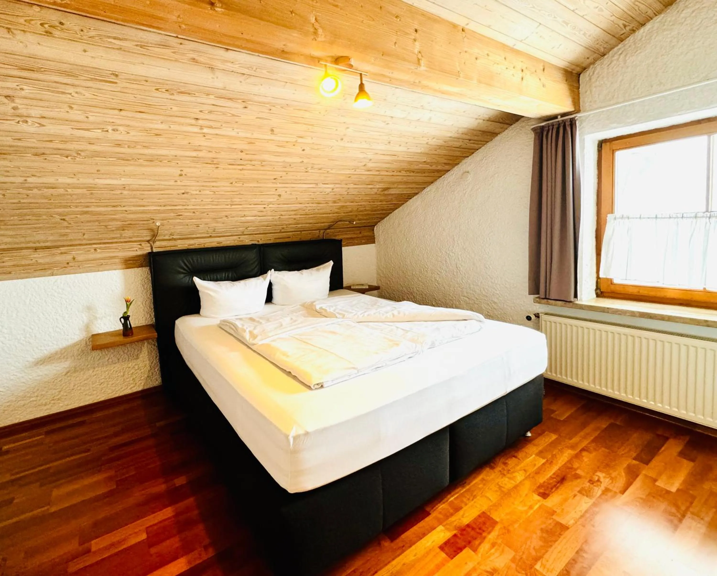 Bed in Appartement-Hotel-Allgayer