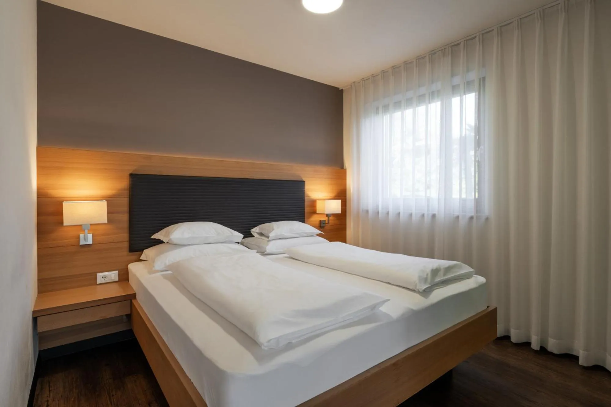 Bed in Alagundis Apartment Residence