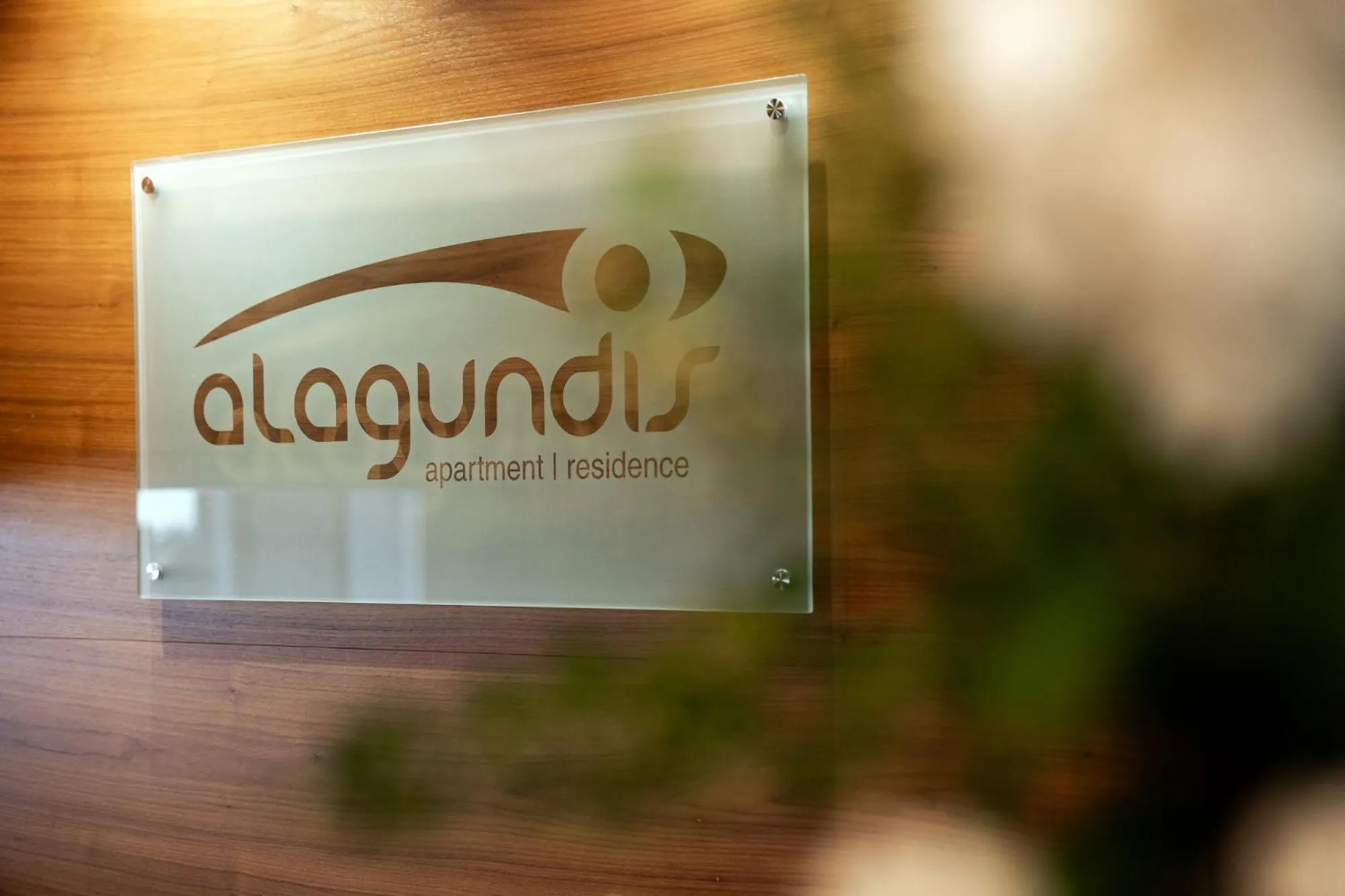 Property logo or sign in Alagundis Apartment Residence