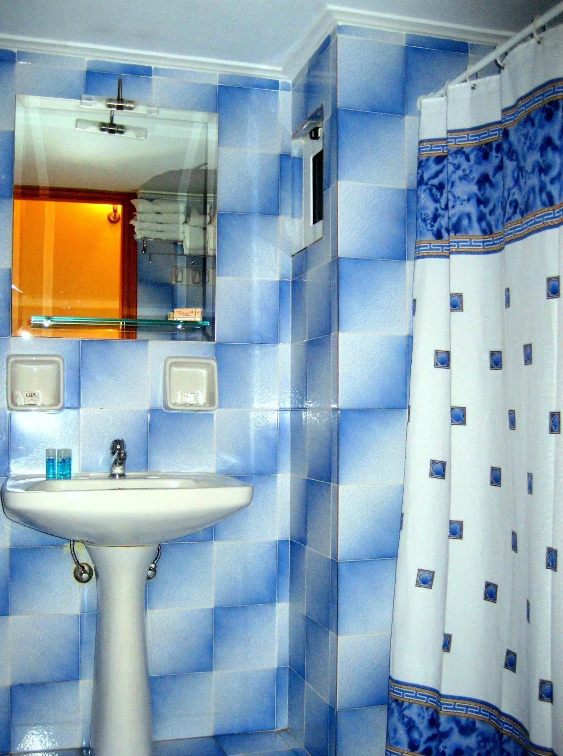 Triple Room with City View in Elysee Hotel Triple Room with City View in Elysee Hotel