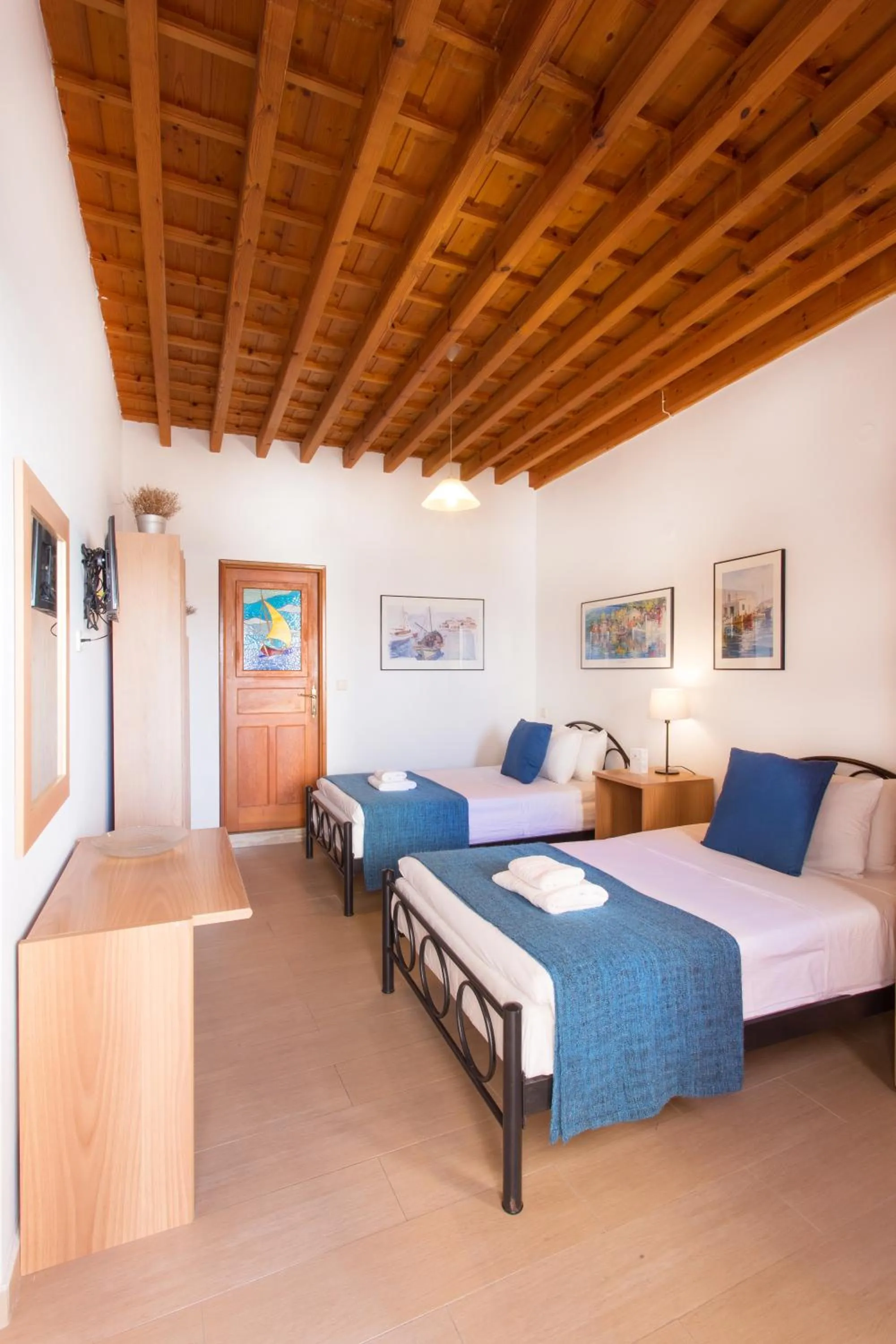 Bed in Thea Villas and Suite