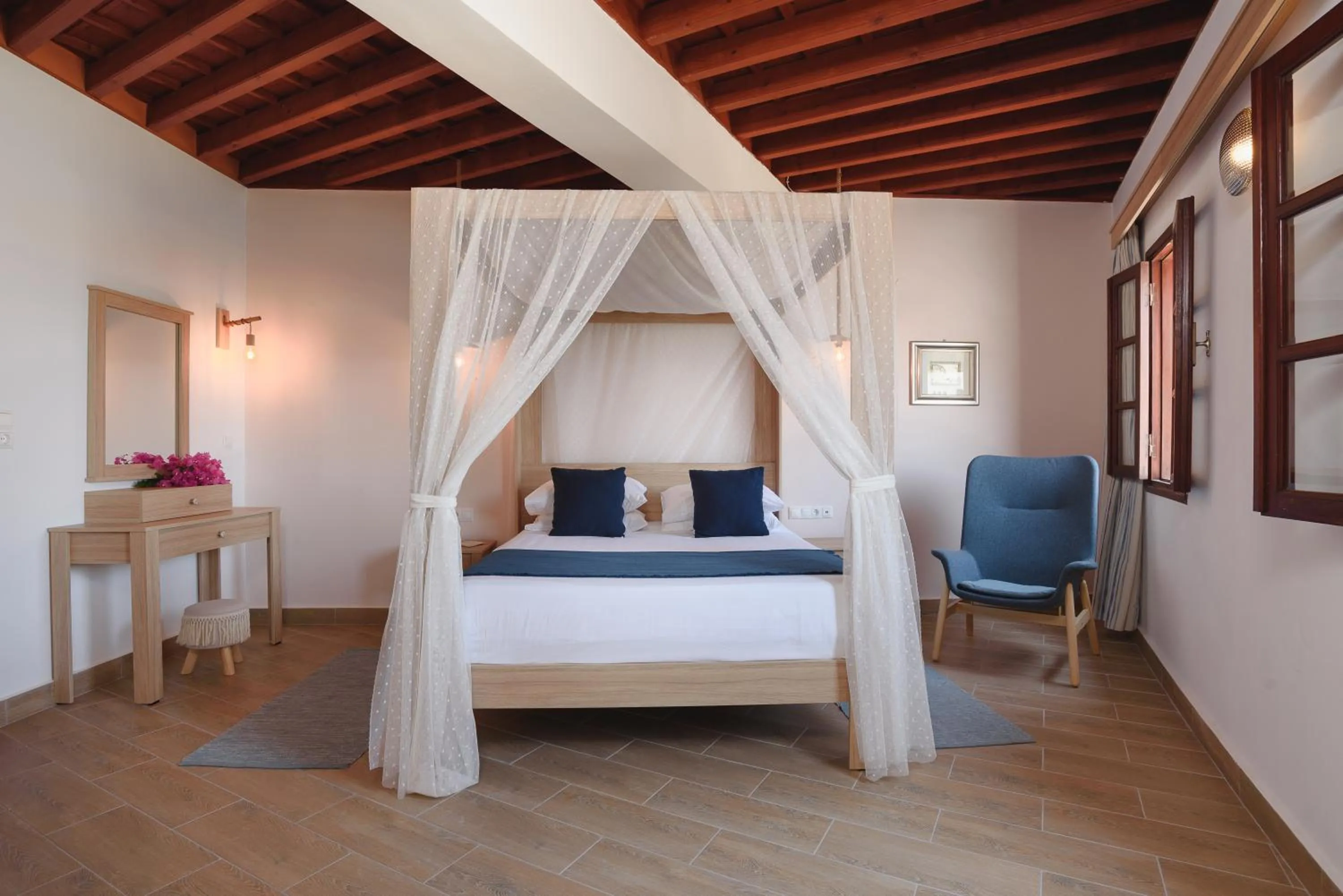 Bed in Thea Villas and Suite