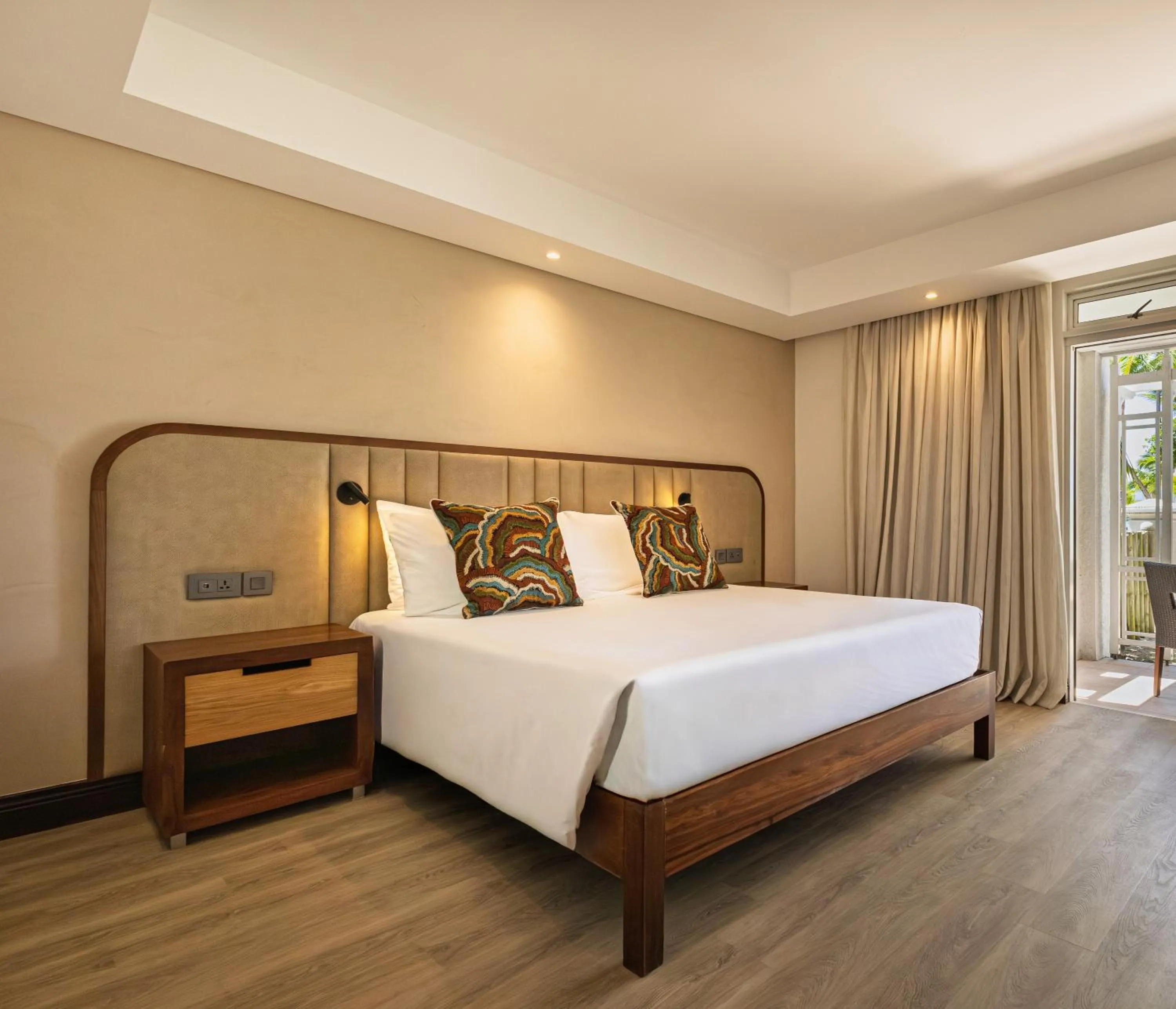 Bed in Shandrani Beachcomber Resort & Spa