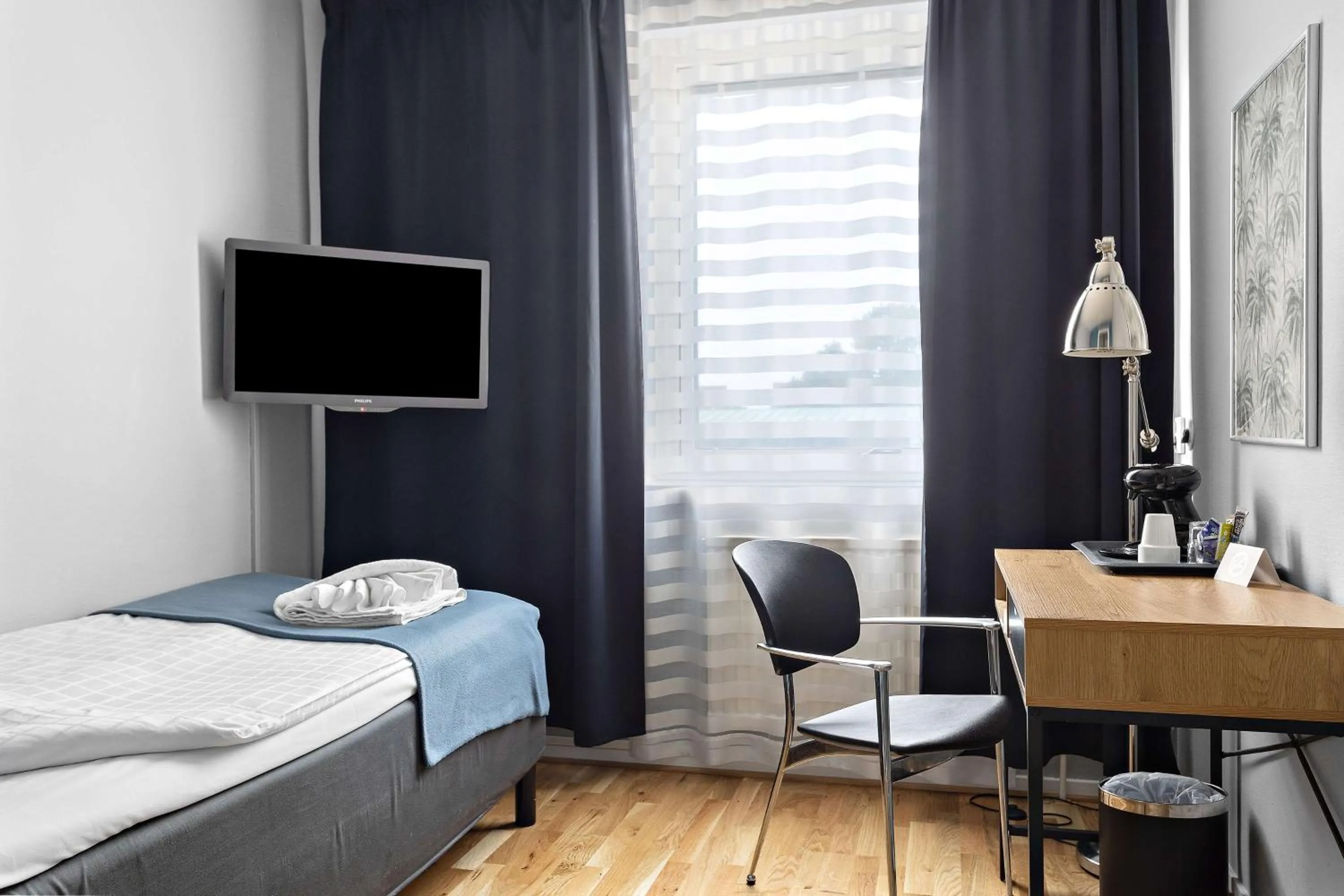 Seating area, Bed in Palm Tree Hotel, Best Western Signature Collection