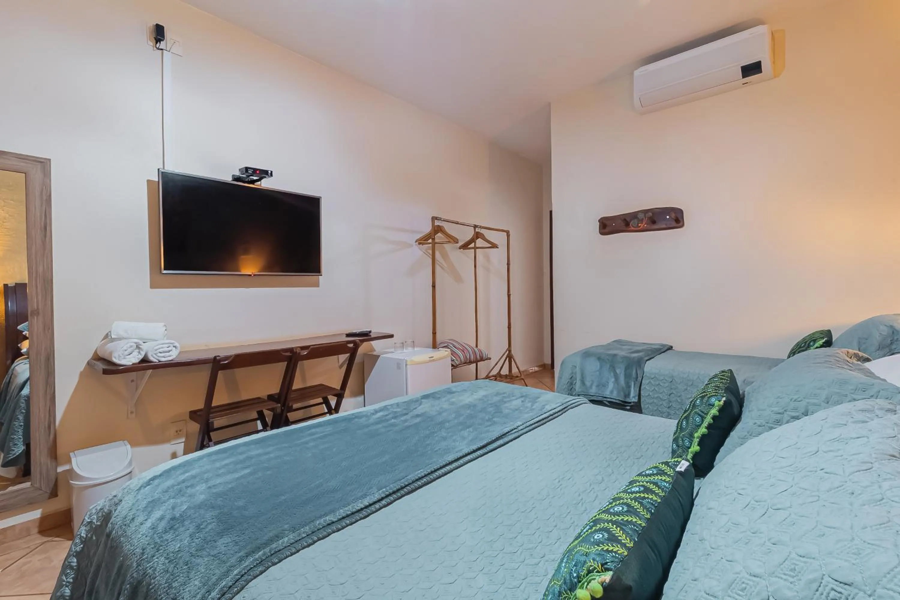 Bed in Pousada Flores do Cerrado