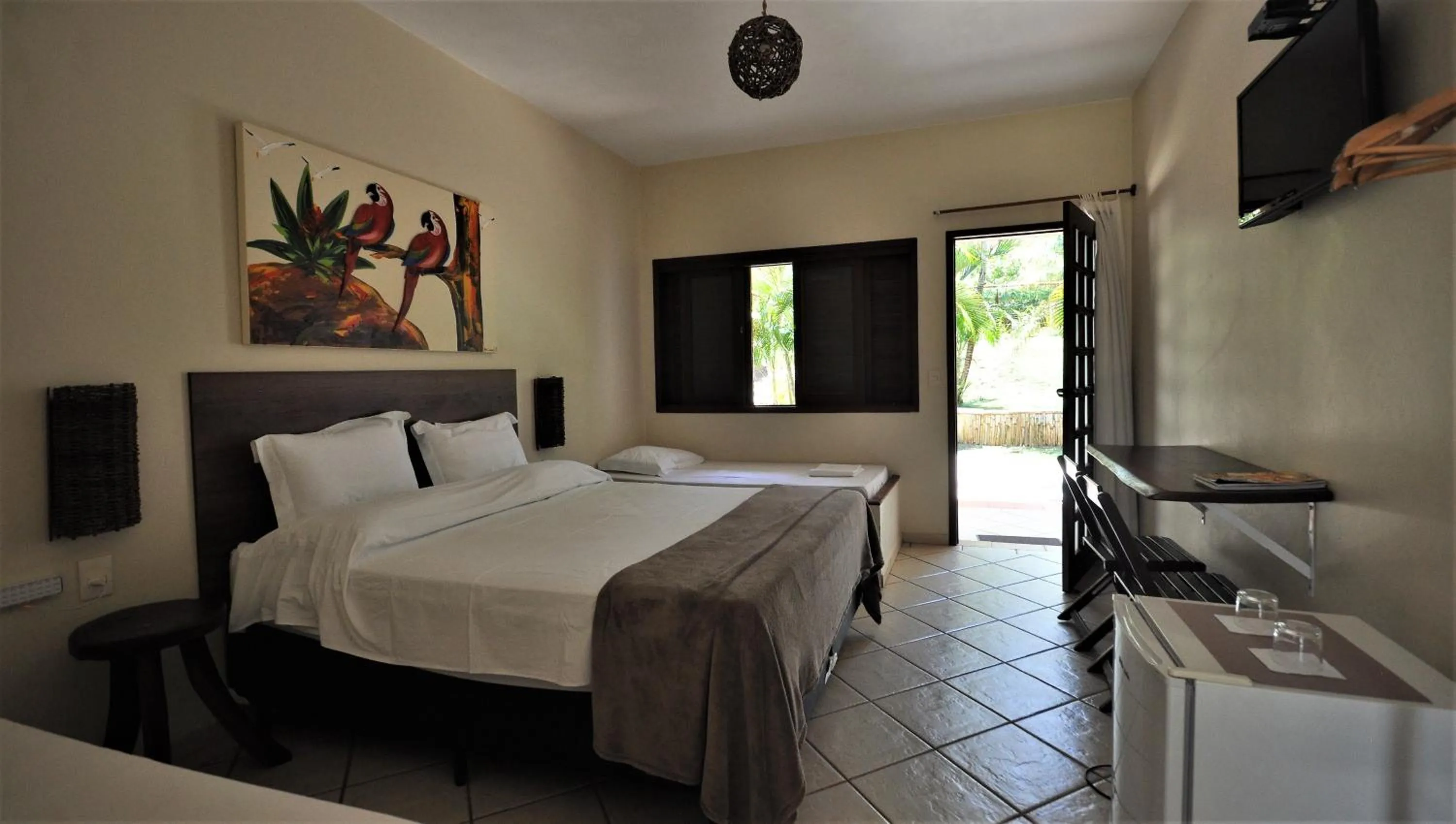 Bed in Pousada Flores do Cerrado