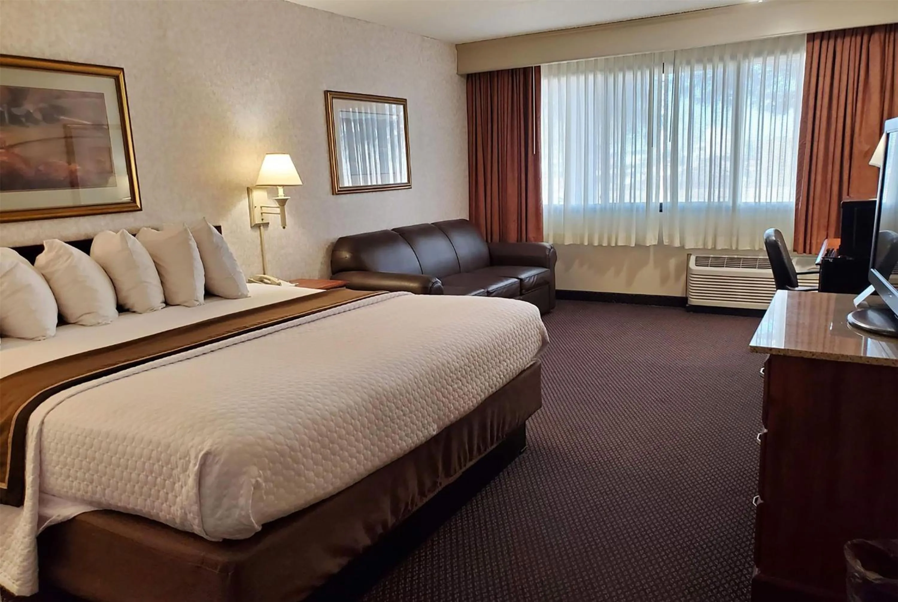 Photo of the whole room, Bed in AmericInn by Wyndham Watertown