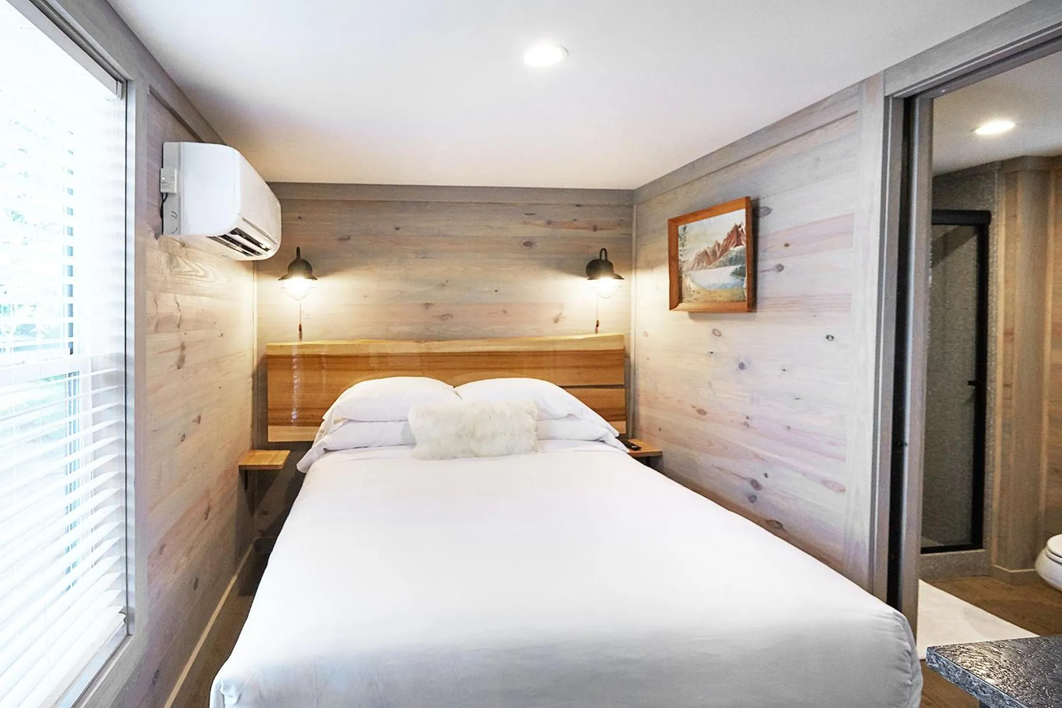 Bed in Asheville River Cabins