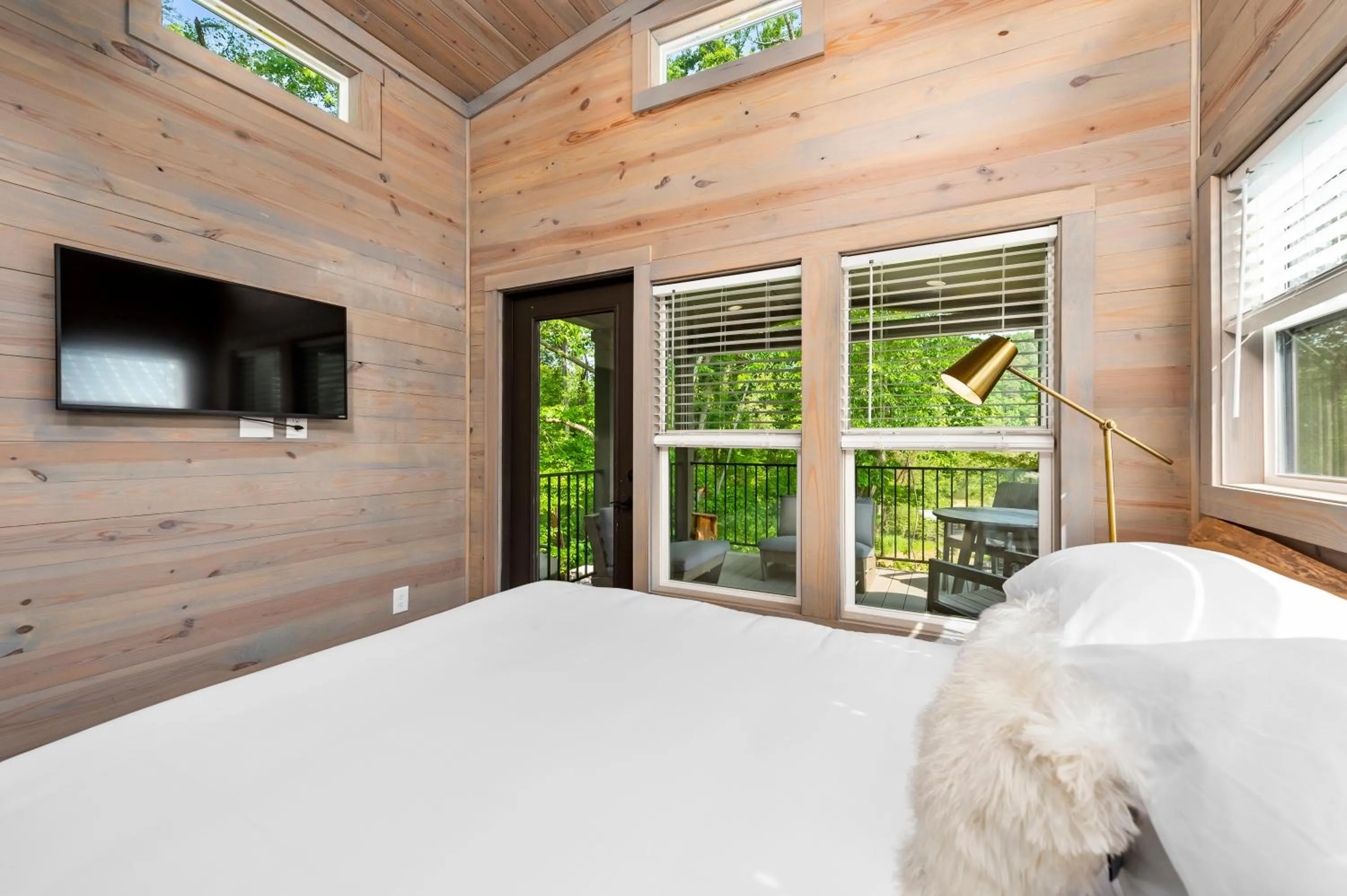 Bed in Asheville River Cabins