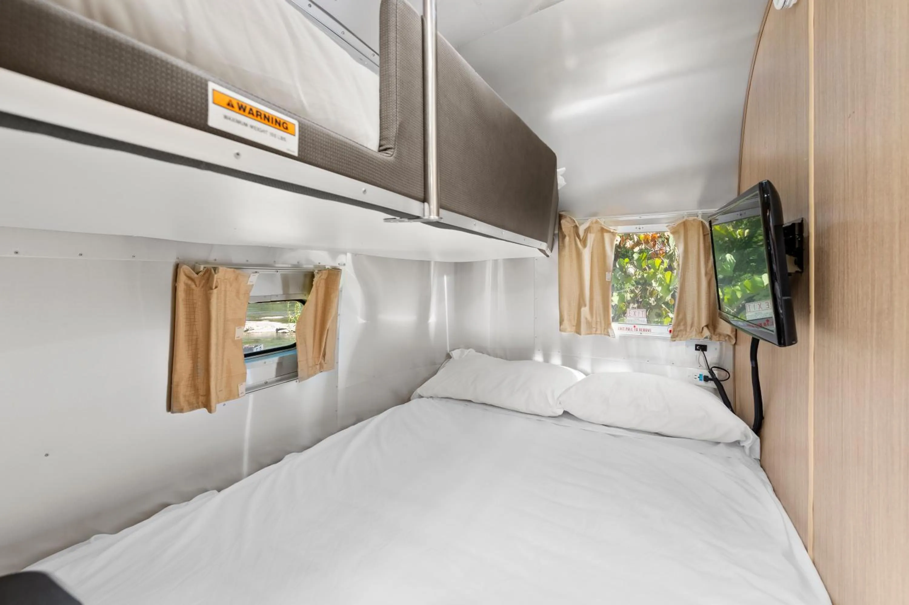 Bed in Asheville River Cabins