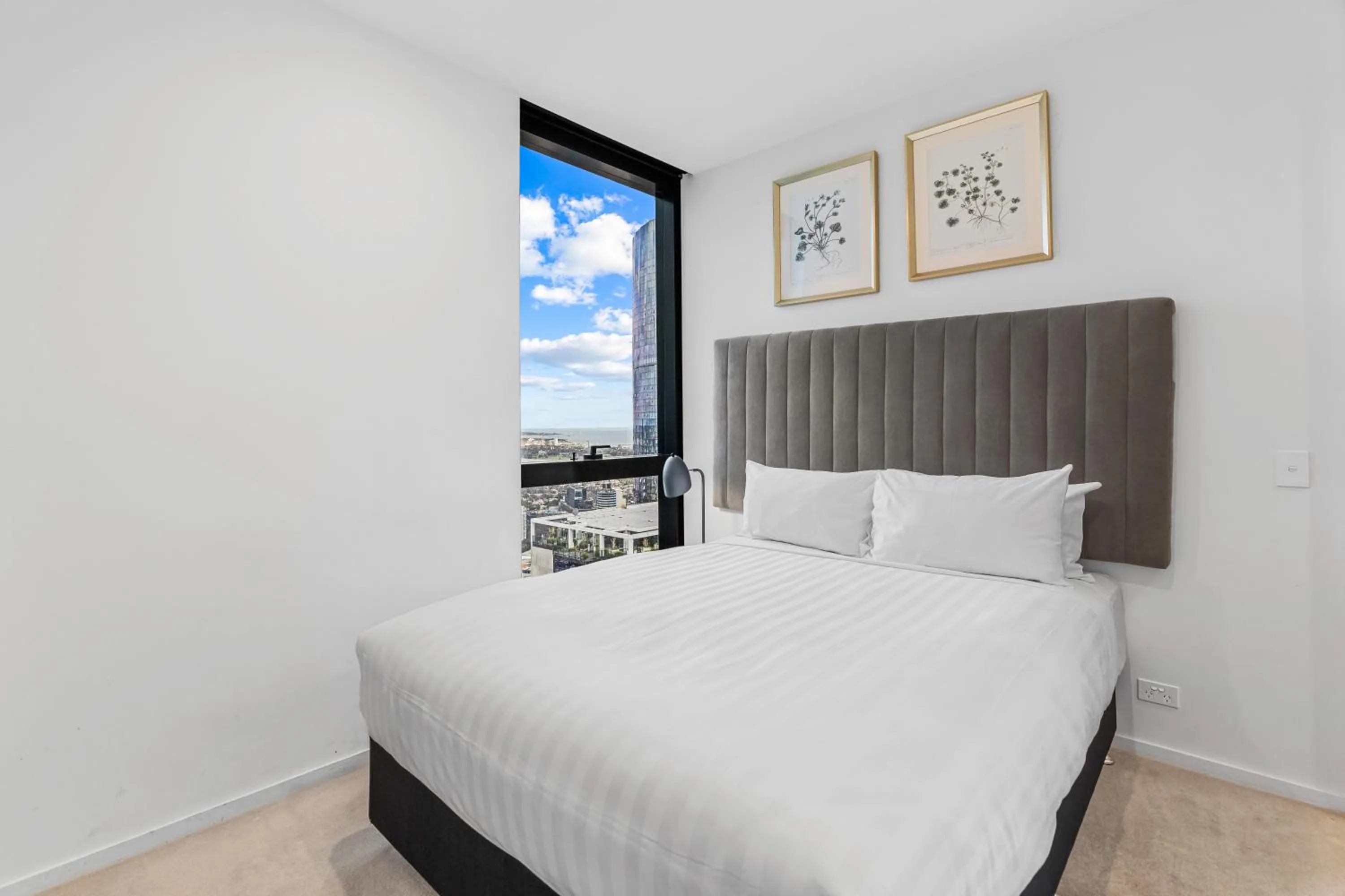 Bed in CLLIX Australia 108 Apartments