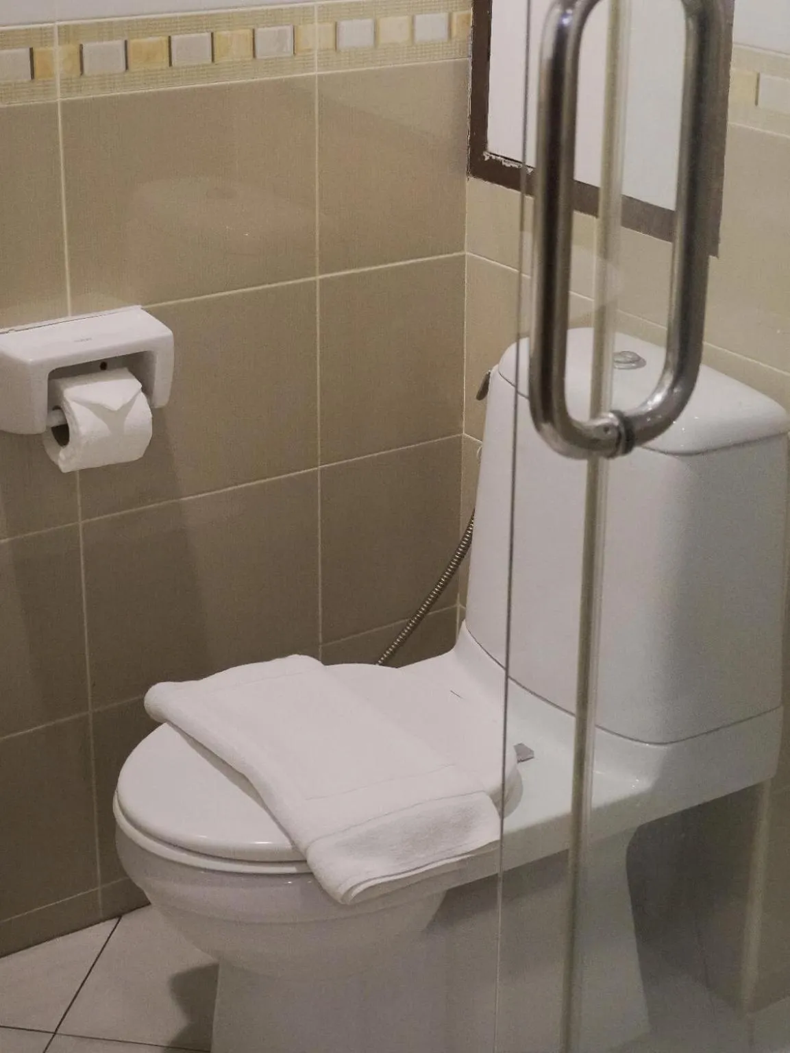 Bathroom in Teja Hotel