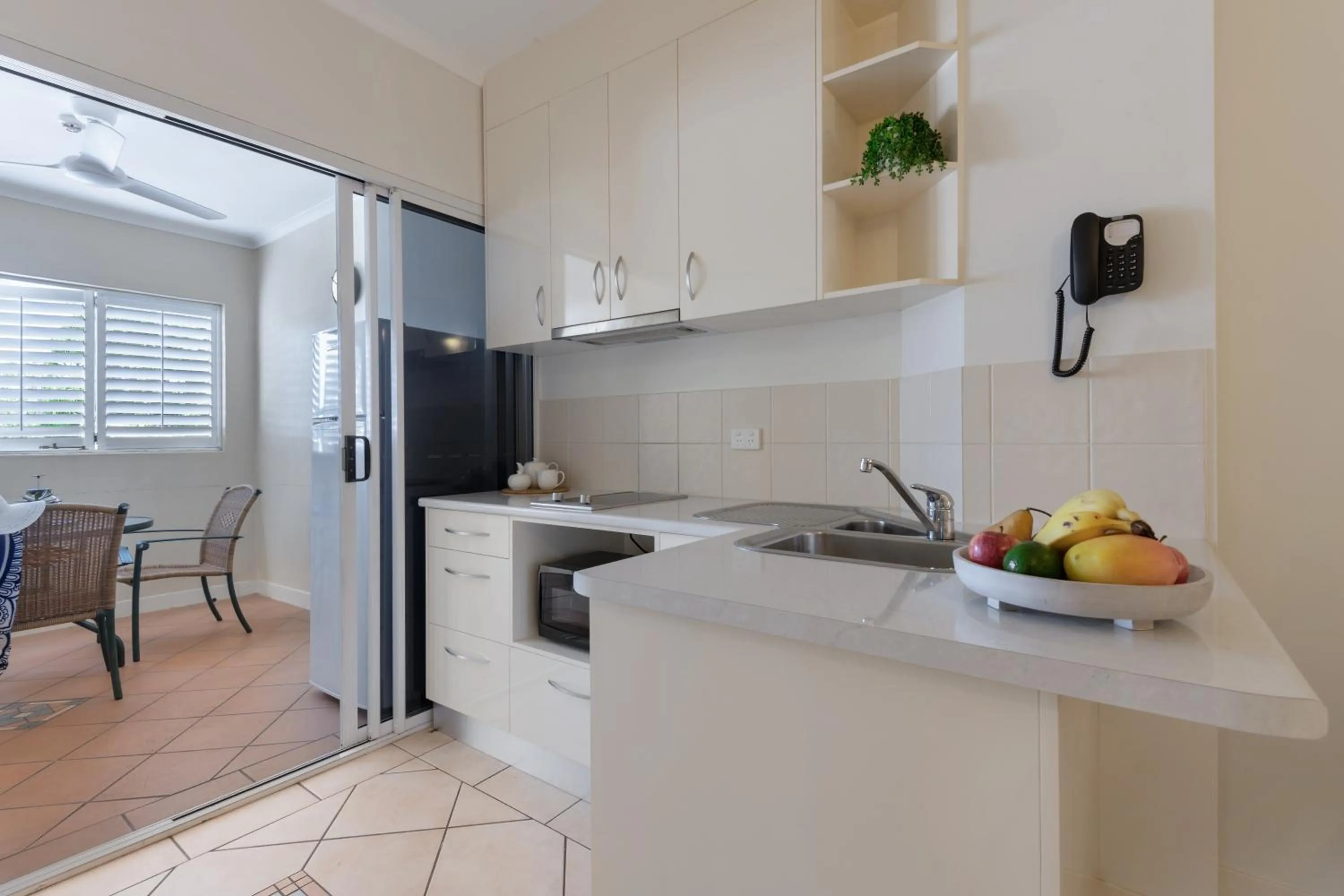 Kitchen or kitchenette in The Newport on Macrossan - Adults Only