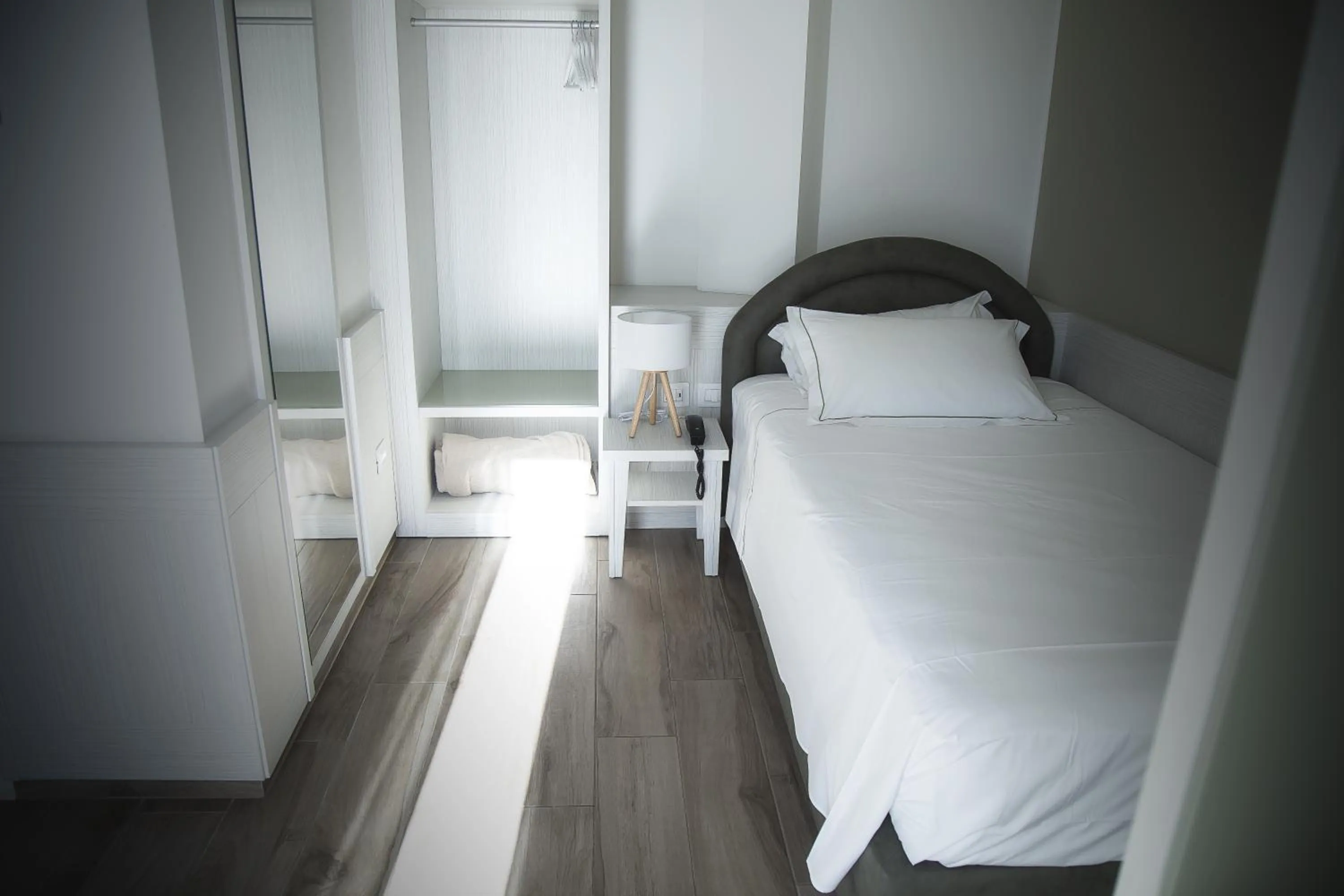 Bed in Hotel Adriatico