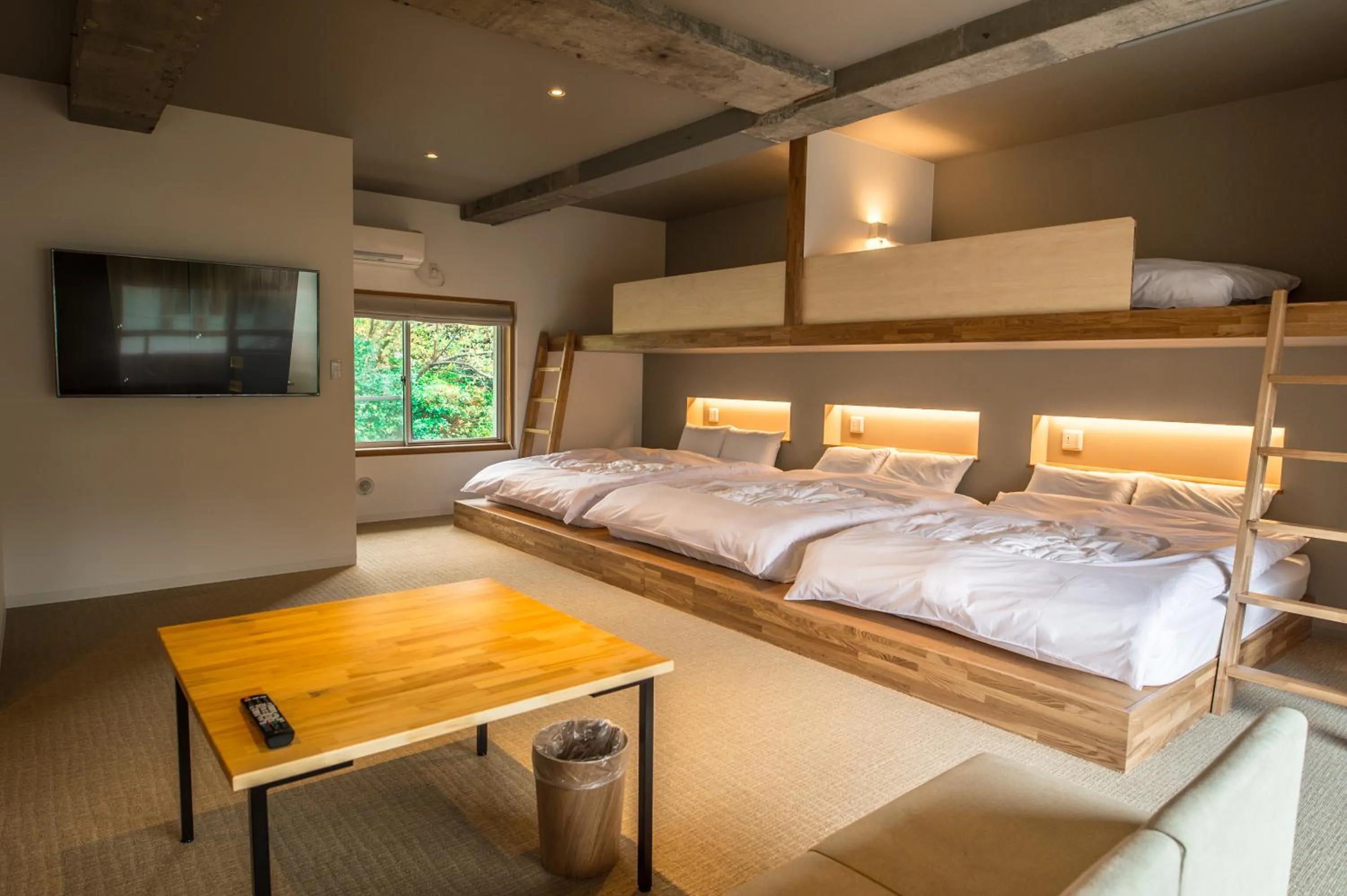 Living room, Bed in WPU HOTEL Hakone