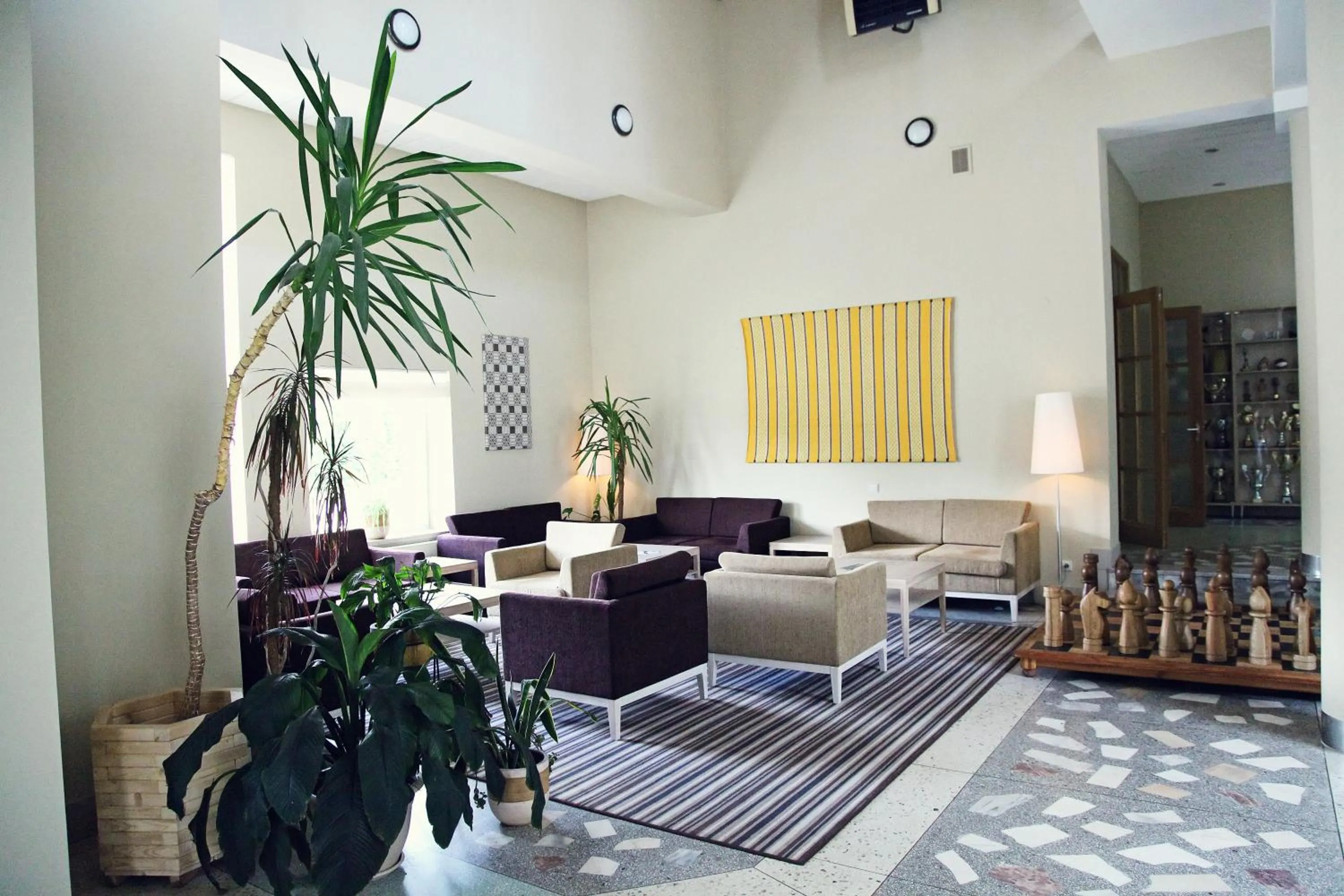 Communal lounge/ TV room in Nykščio Namai & SPA