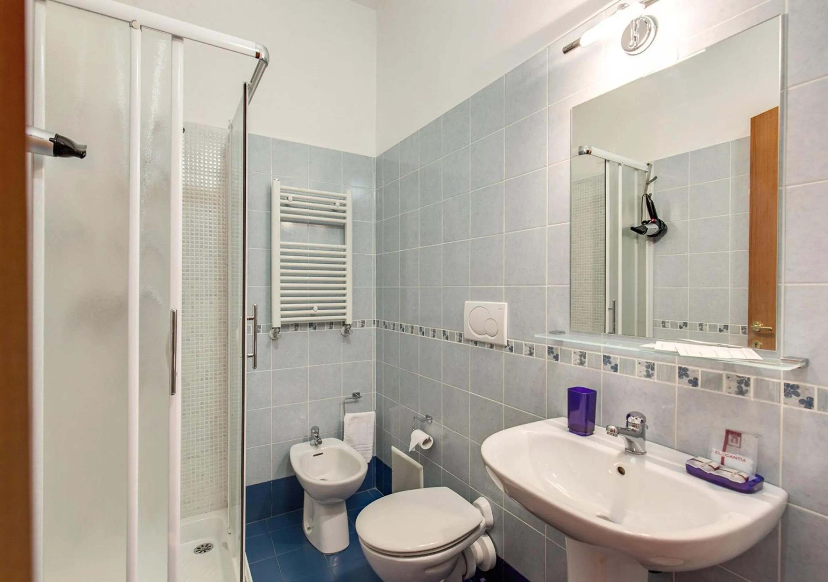 Bathroom in Bon Ton Design Rooms by DOT Suites