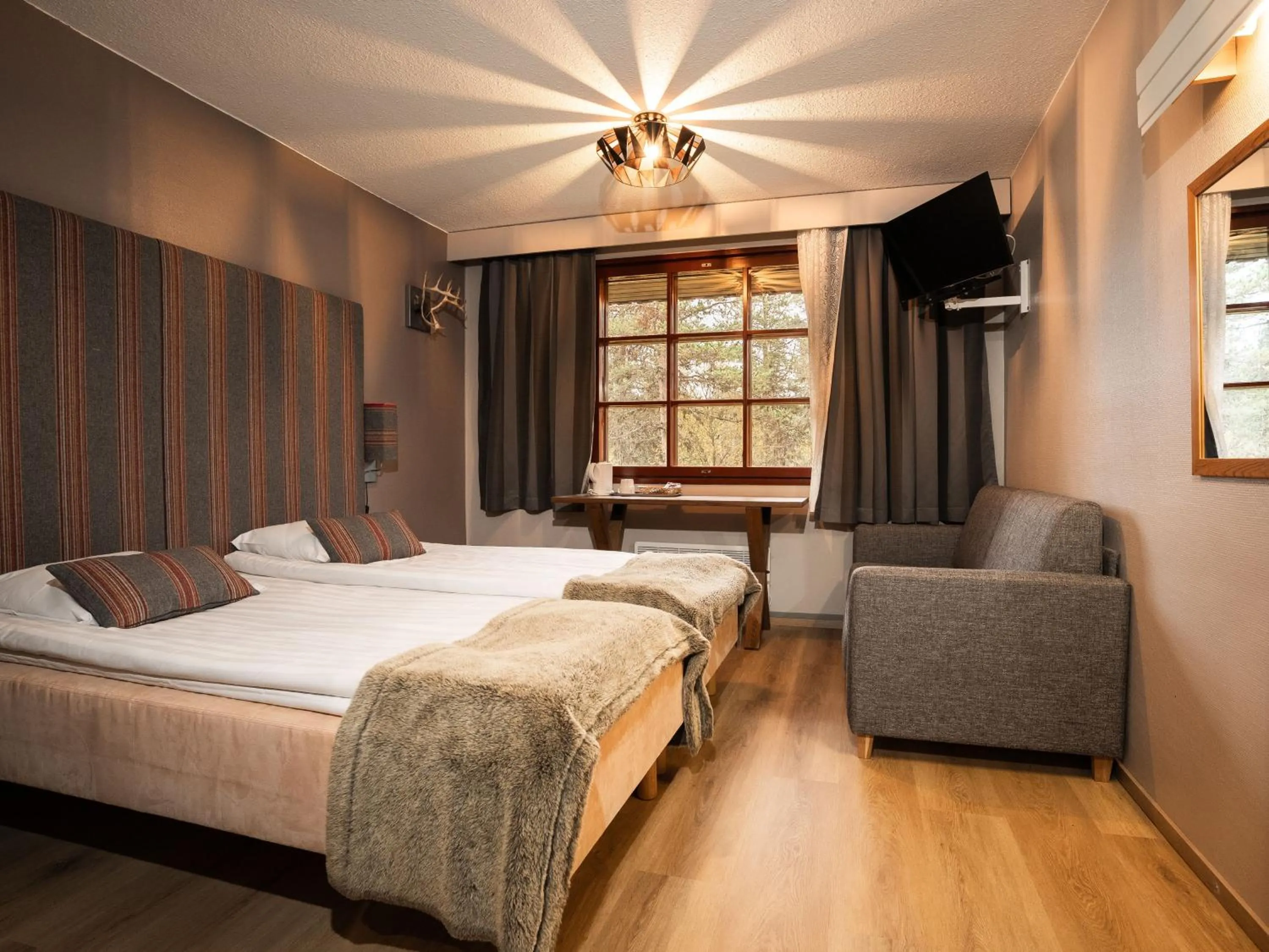 Photo of the whole room, Bed in Santa's Hotel Tunturi