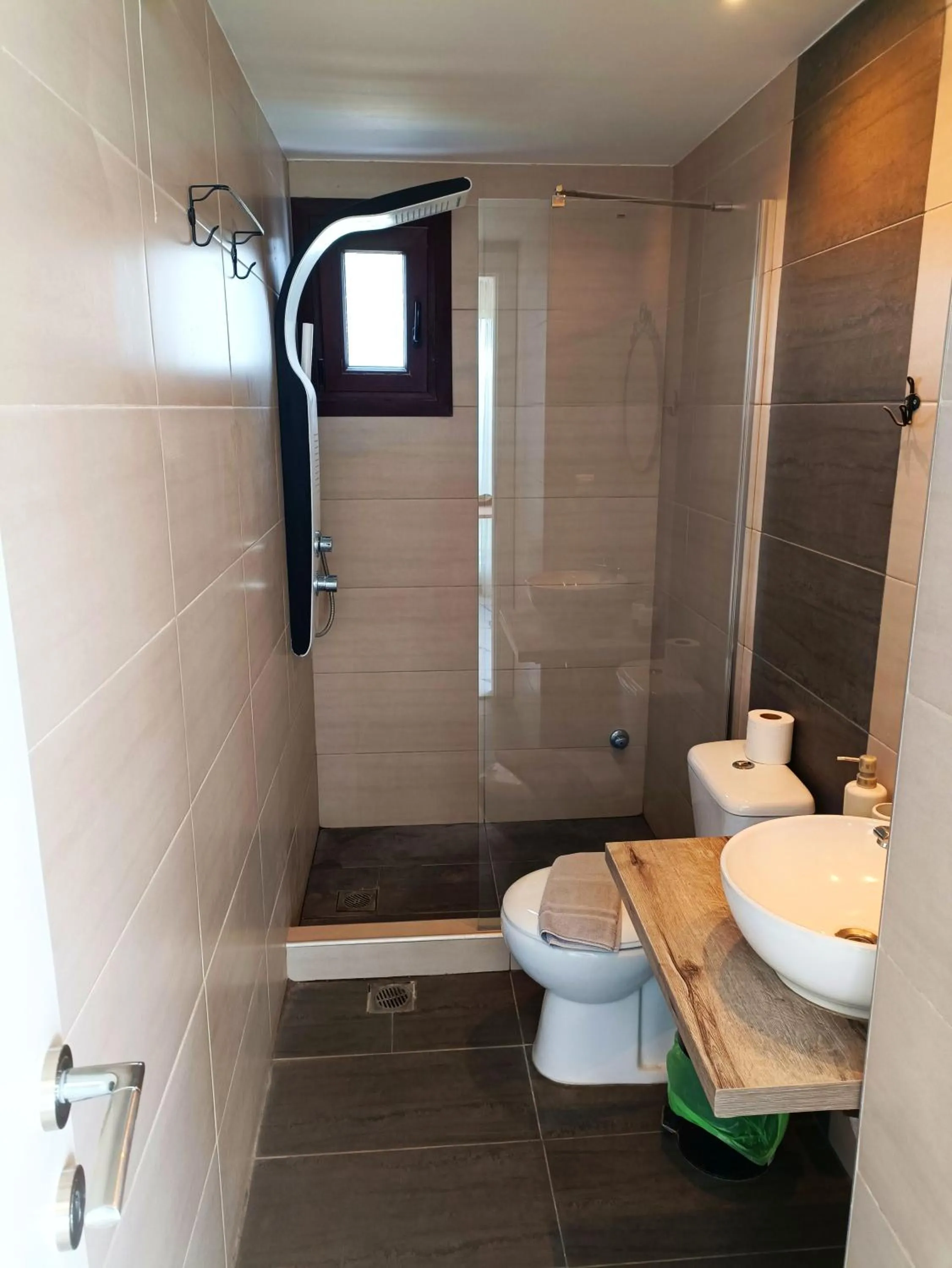 Shower in Salonikiou Beach Apartments & Villas