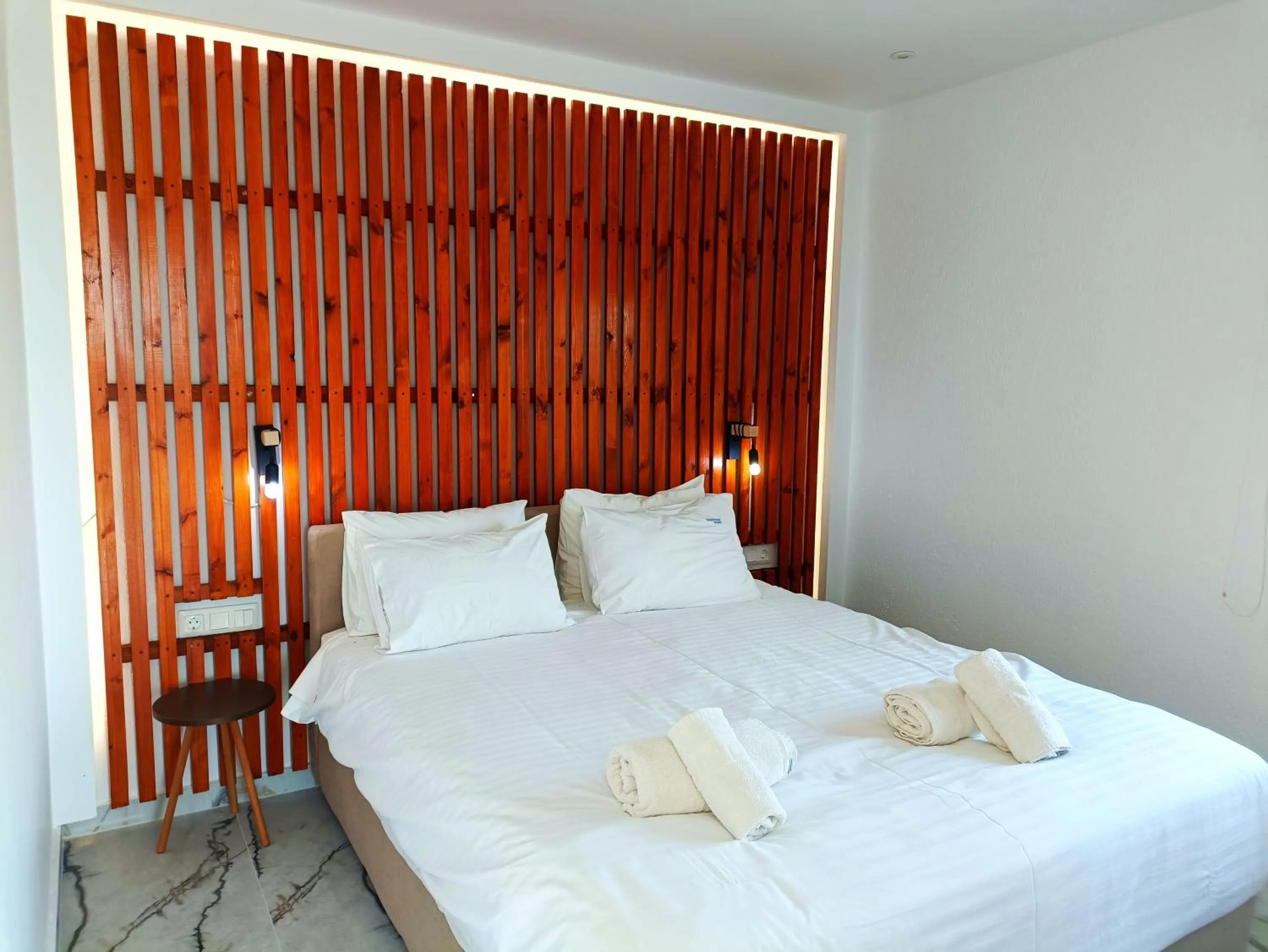 Bed in Salonikiou Beach Apartments & Villas