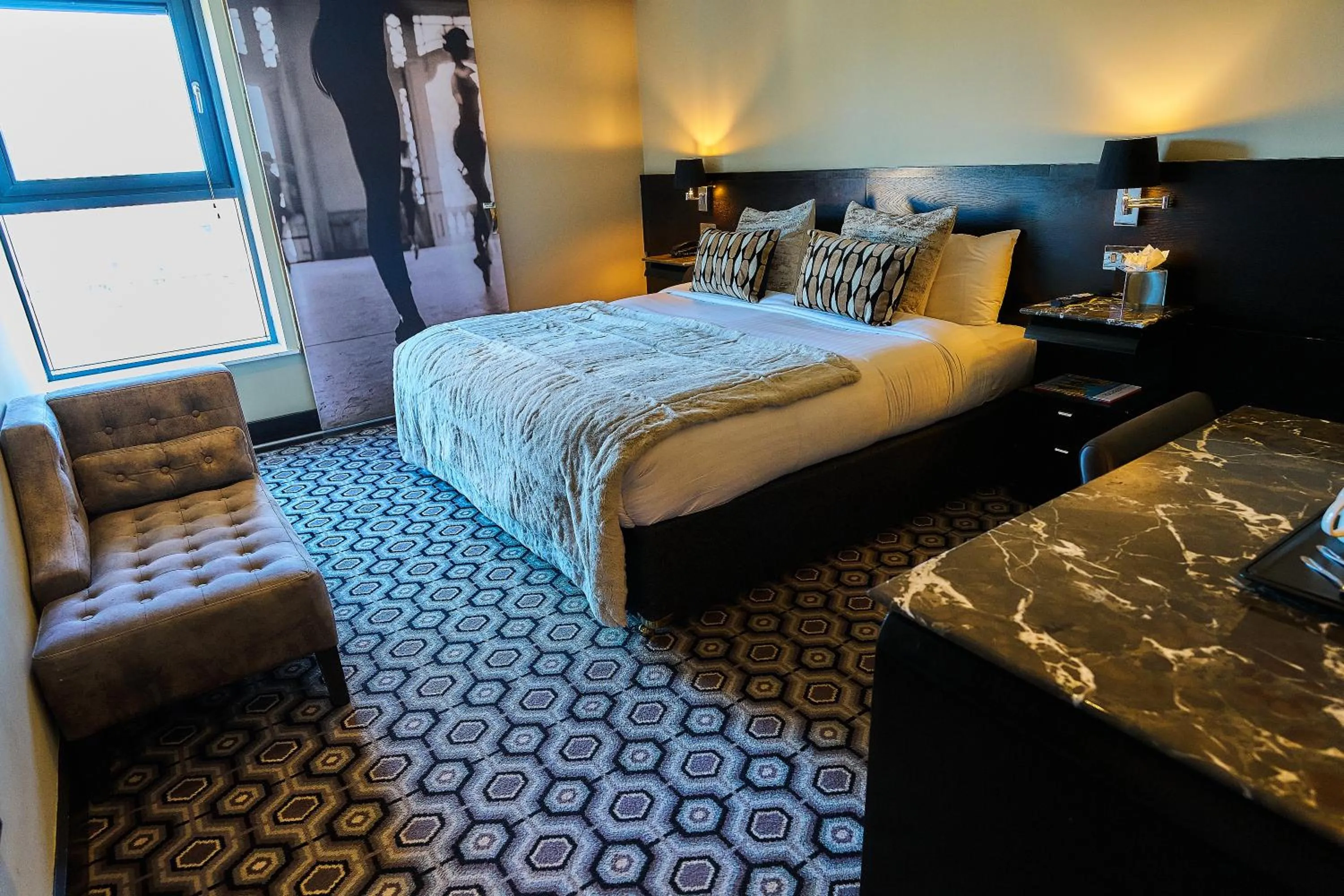 Bed in The Vincent Hotel