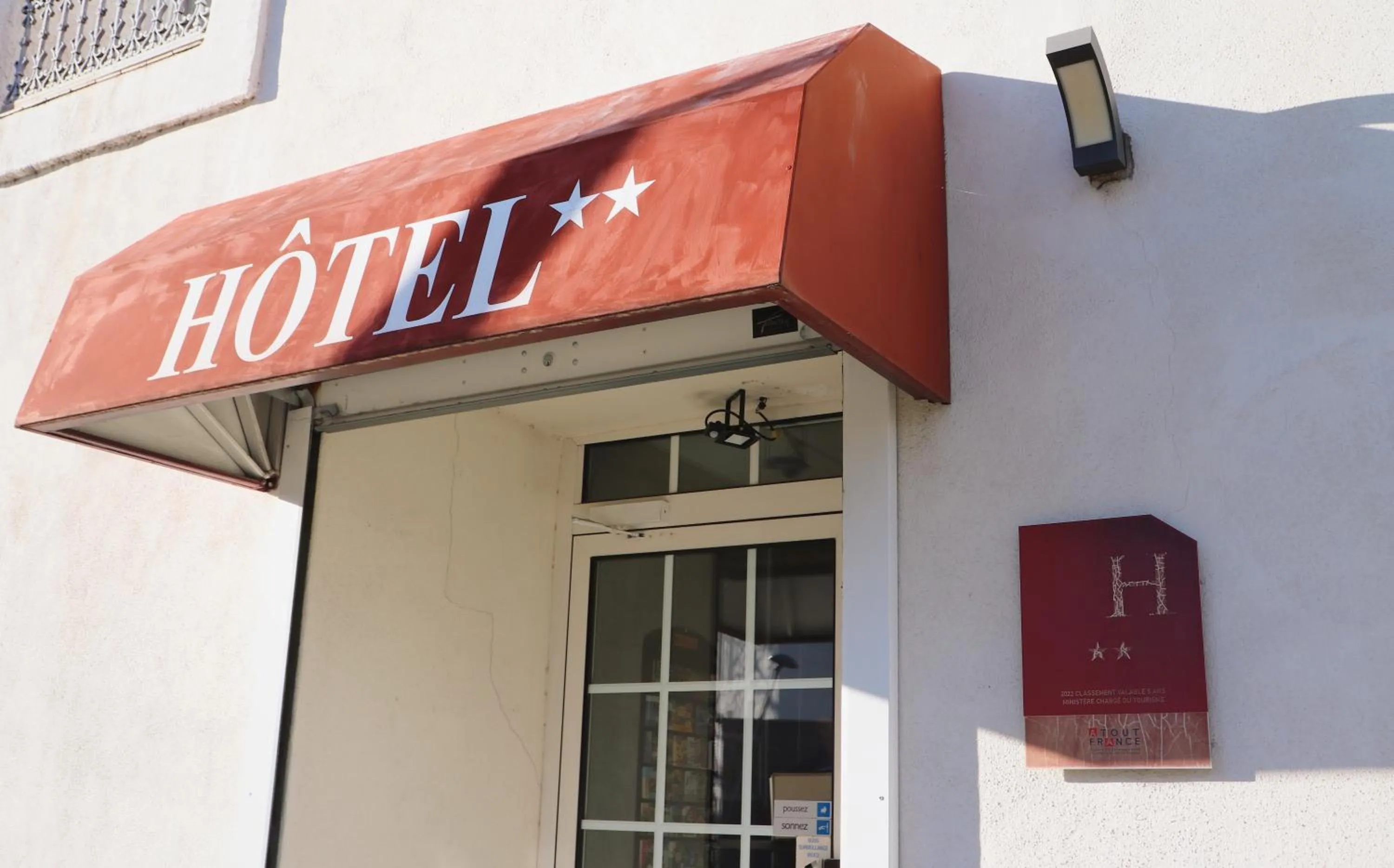 Property logo or sign in Hotel Abelia