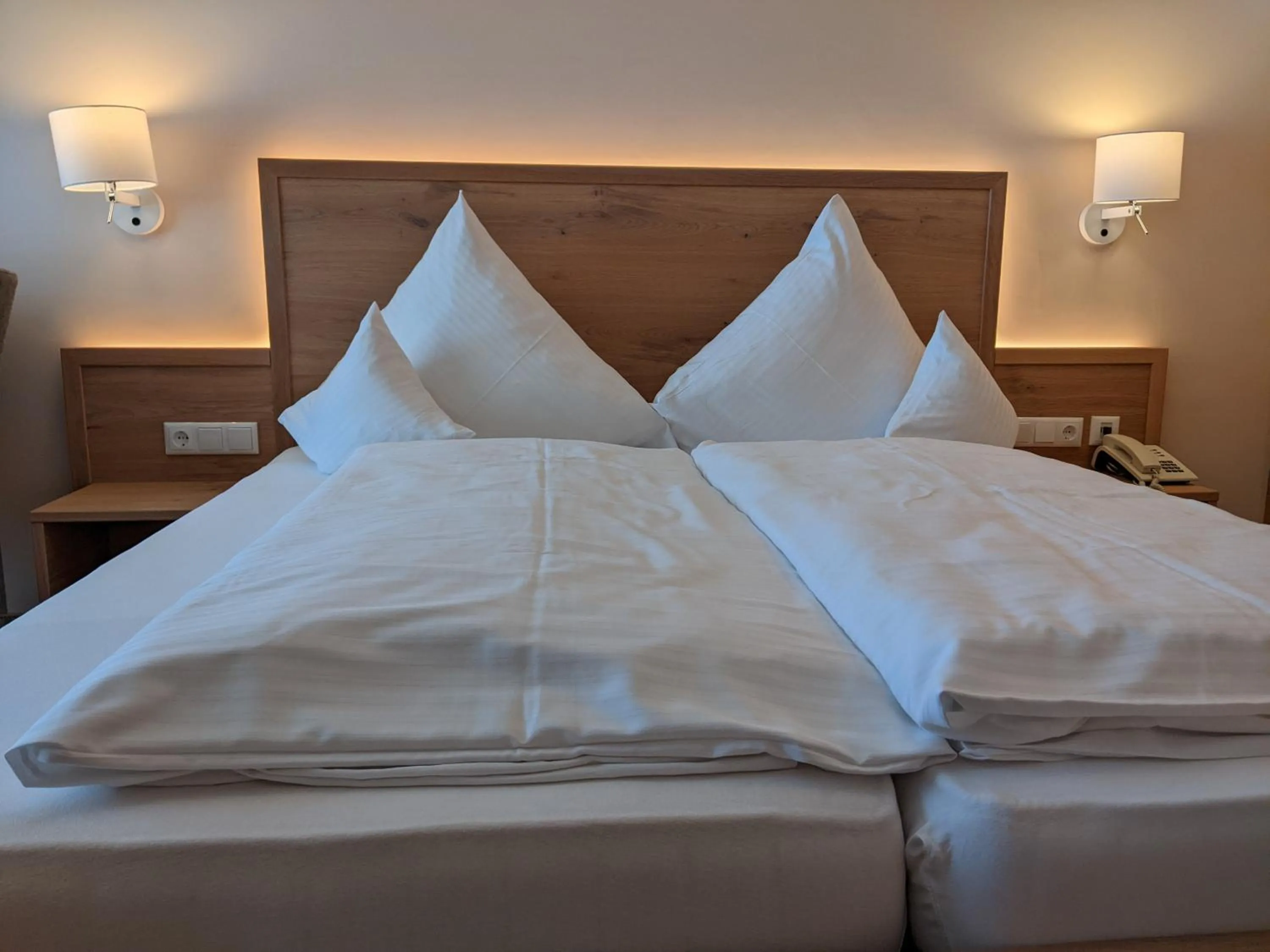 Bed in Hotel Germania