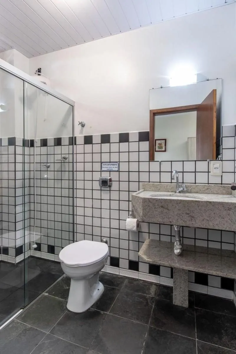 Toilet in Pousada Cores do Mar | Conforto com Piscina em Bombinhas