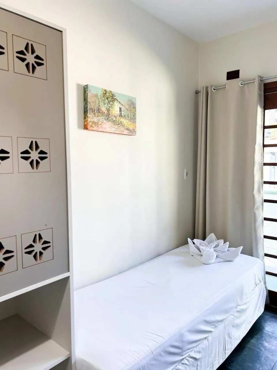 Bed in Pousada Cores do Mar | Conforto com Piscina em Bombinhas