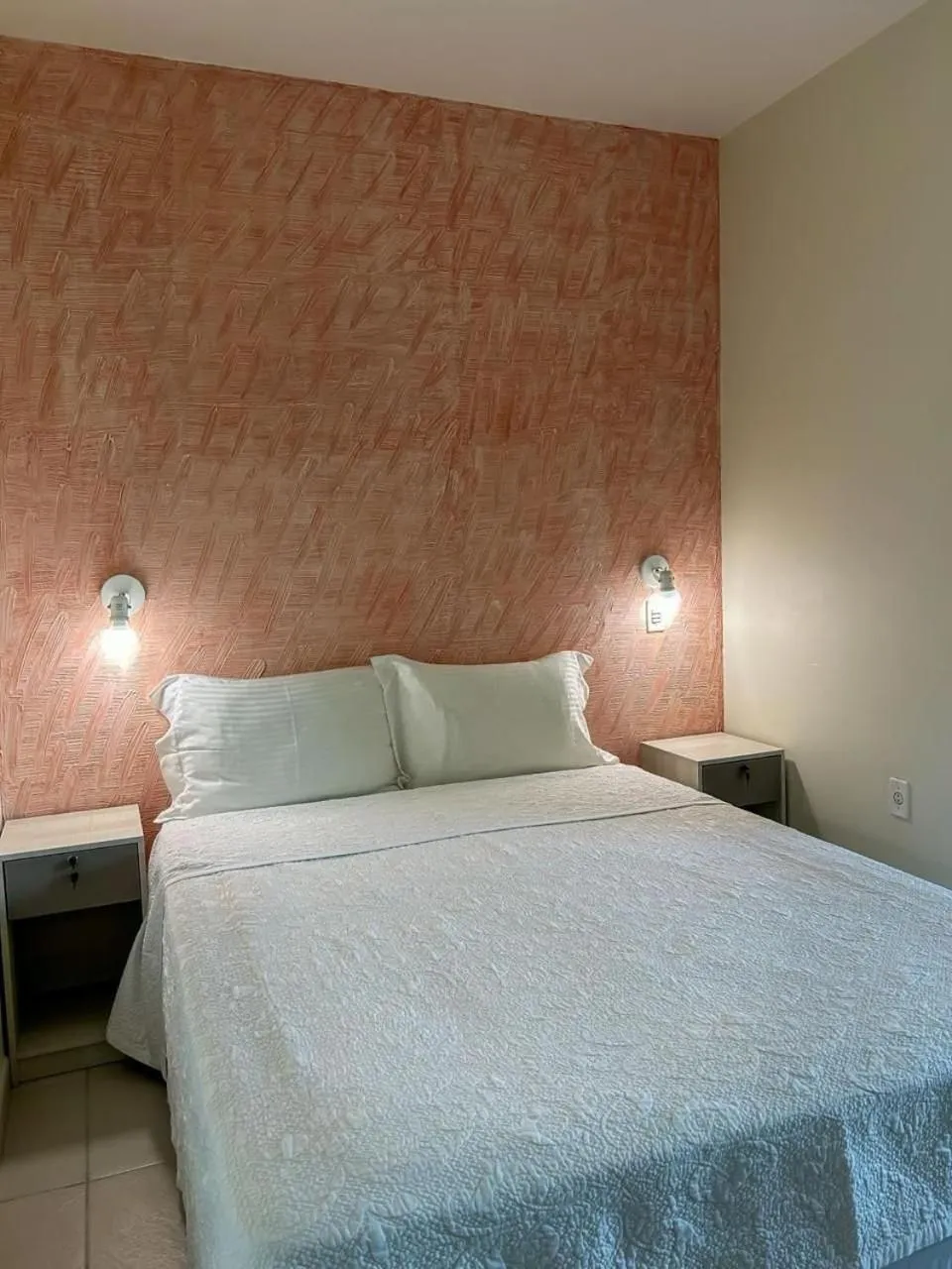 Bed in Pousada Cores do Mar | Conforto com Piscina em Bombinhas