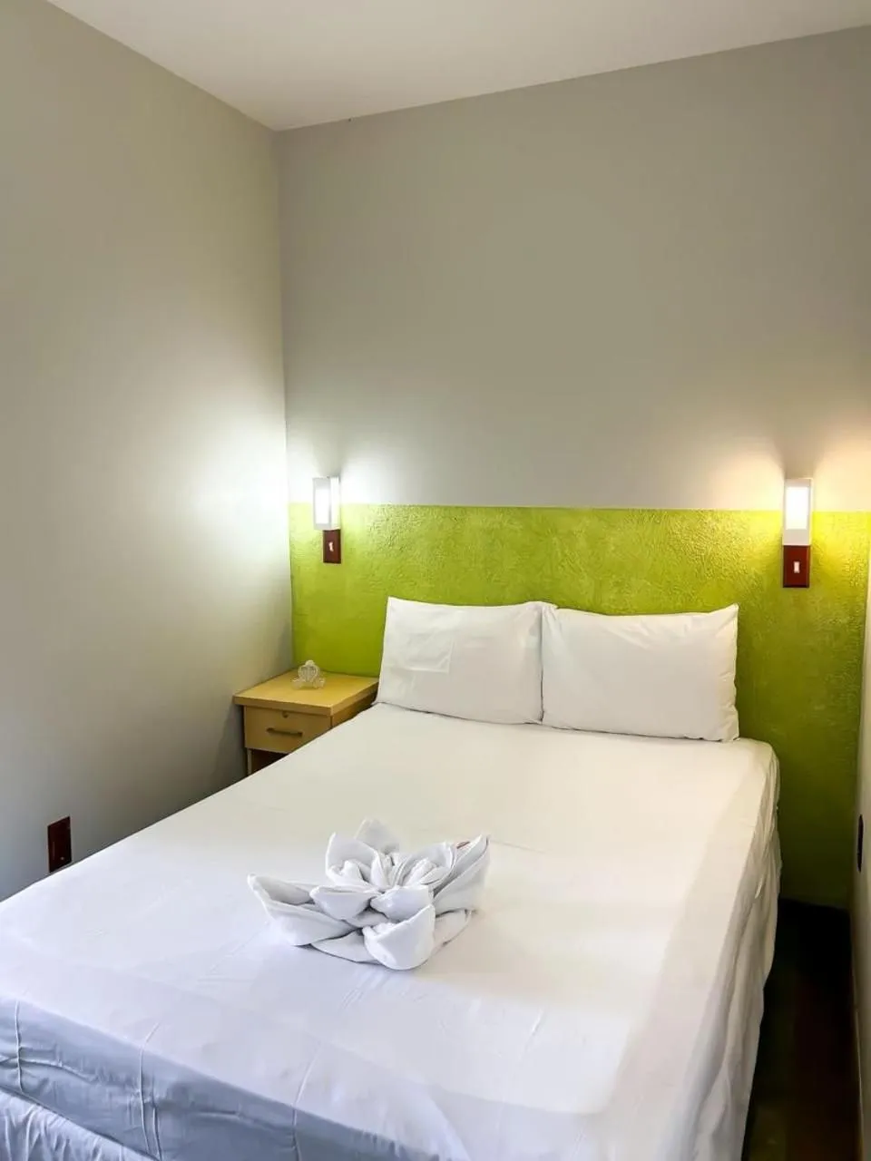 Bed in Pousada Cores do Mar | Conforto com Piscina em Bombinhas