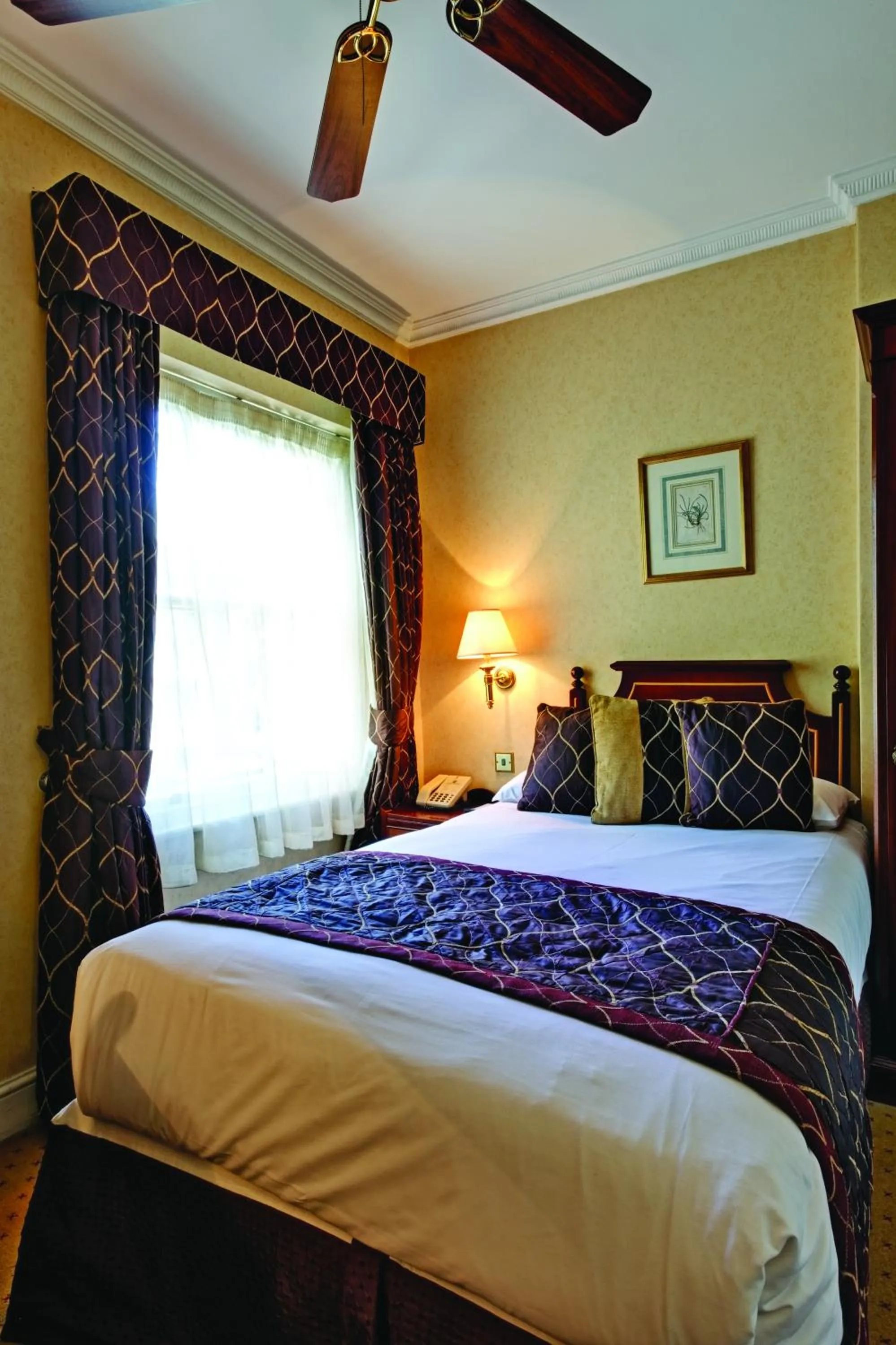 Bedroom in Grange Blooms Hotel