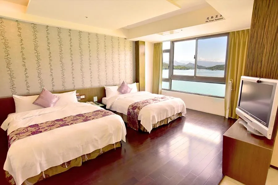 Bed in Miracolo View Hotel