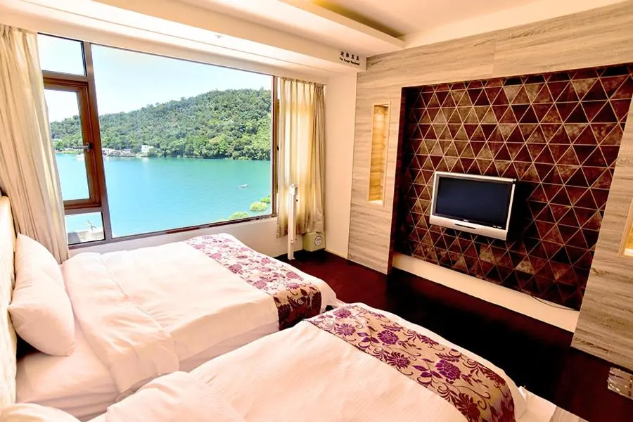 Bed in Miracolo View Hotel