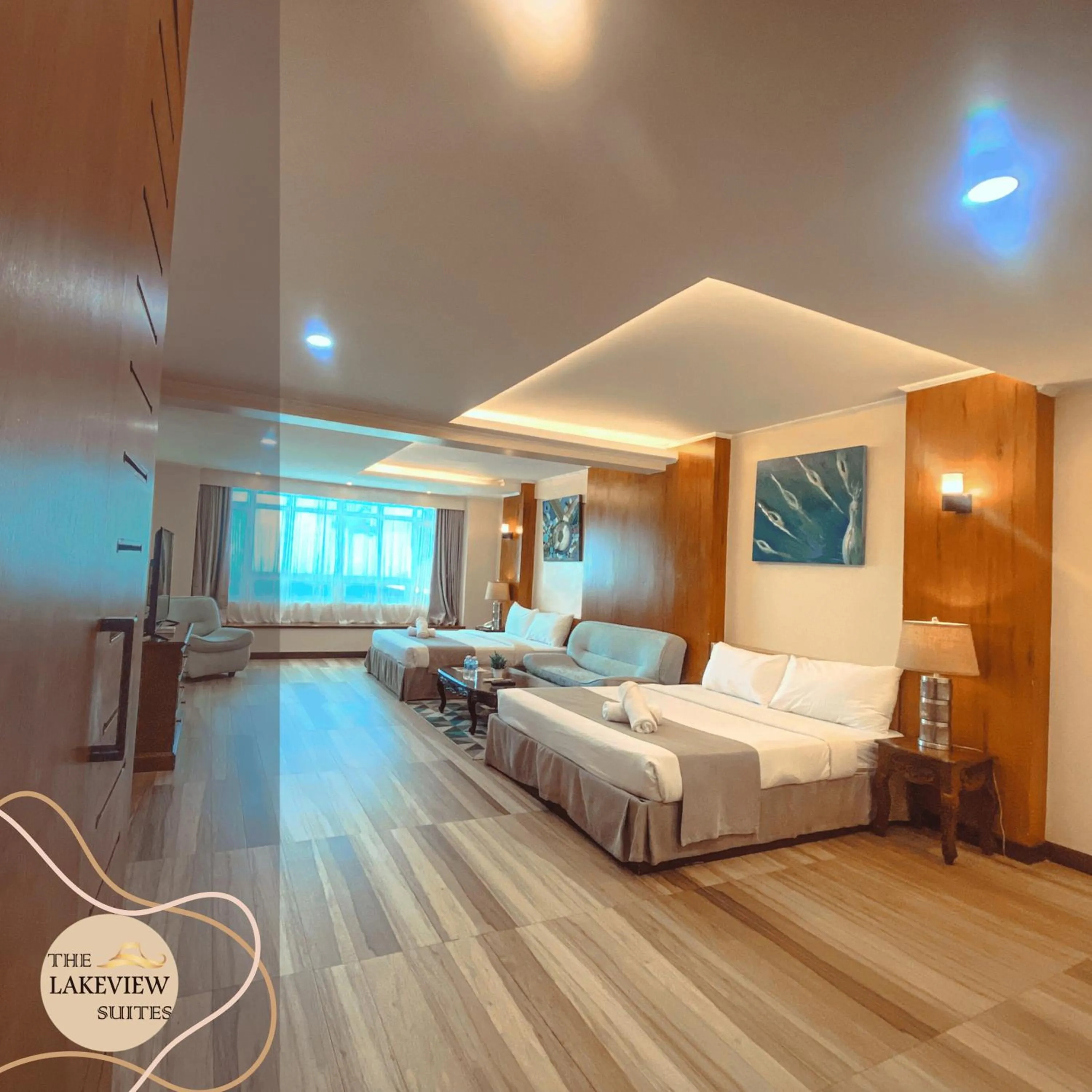 Photo of the whole room, Bed in The Lakeview Suites