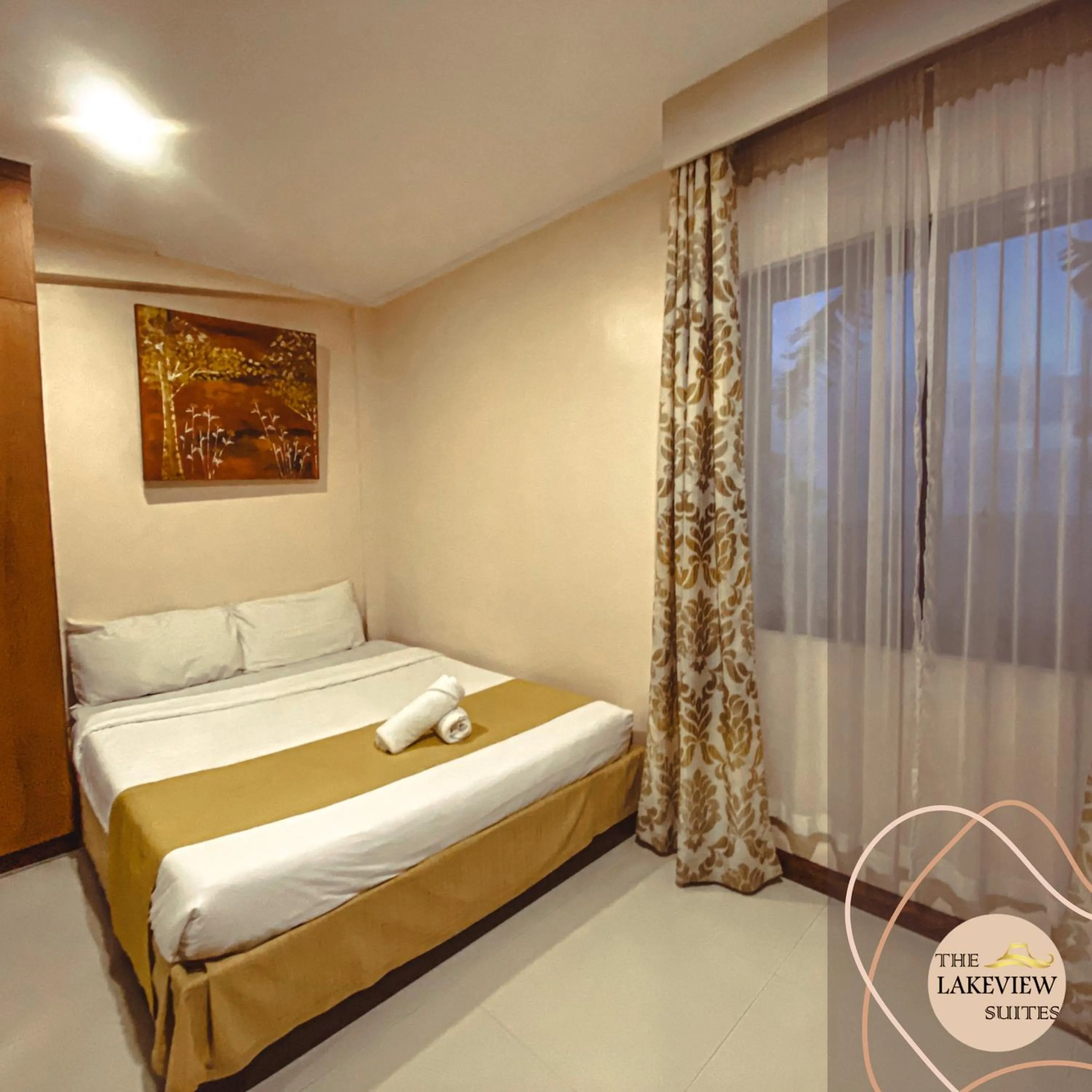 Bed in The Lakeview Suites