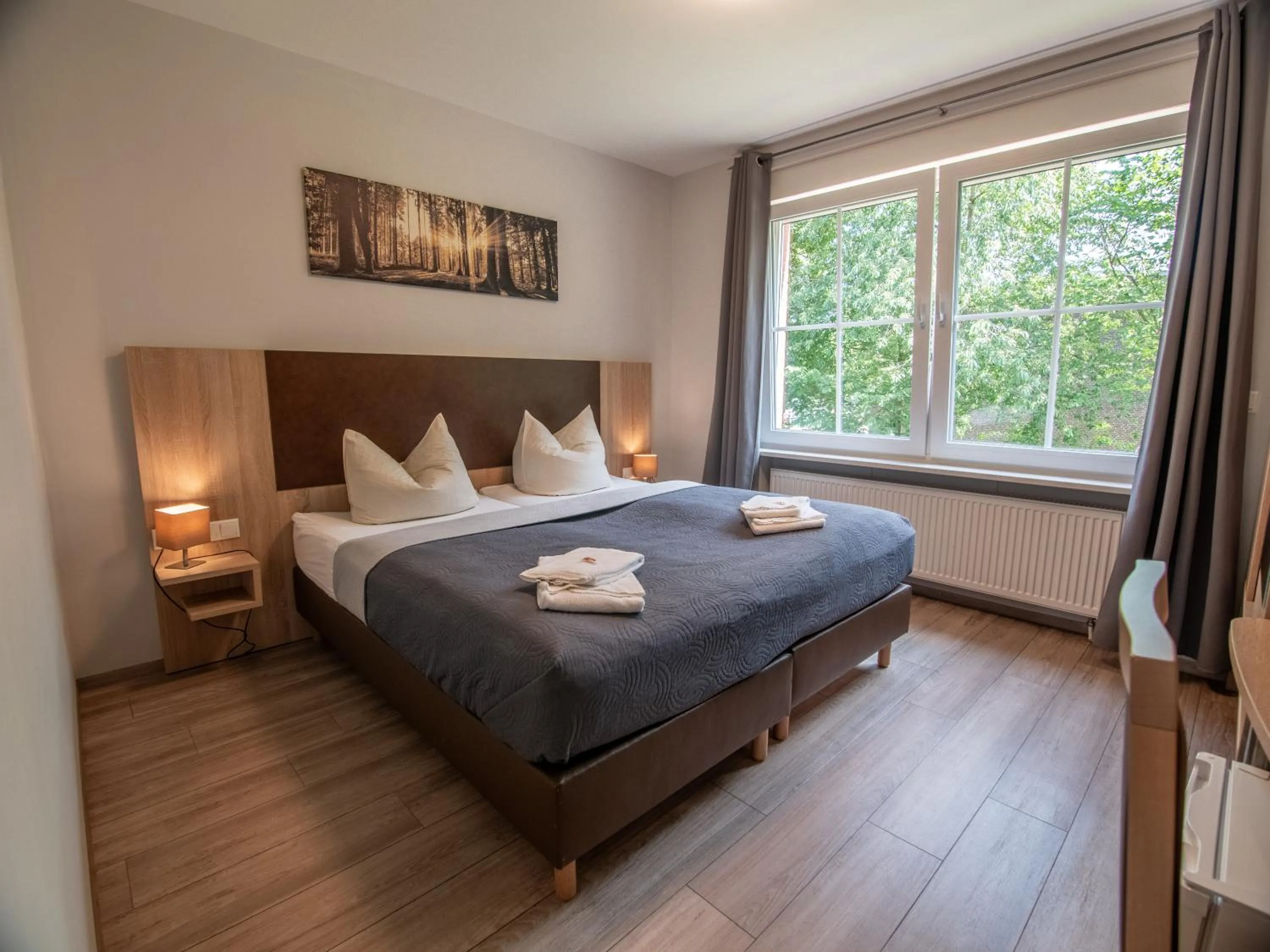 Photo of the whole room, Bed in Tüxen Hotel & Restaurant