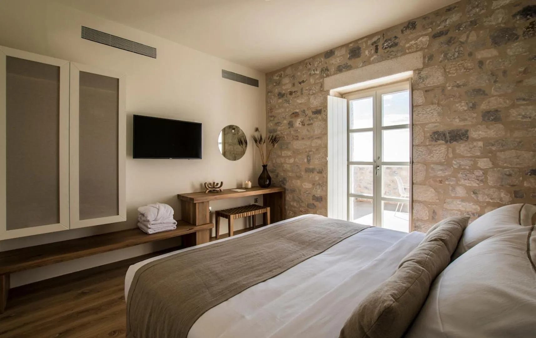 Bed in BASSA MAINA Villas & Suites