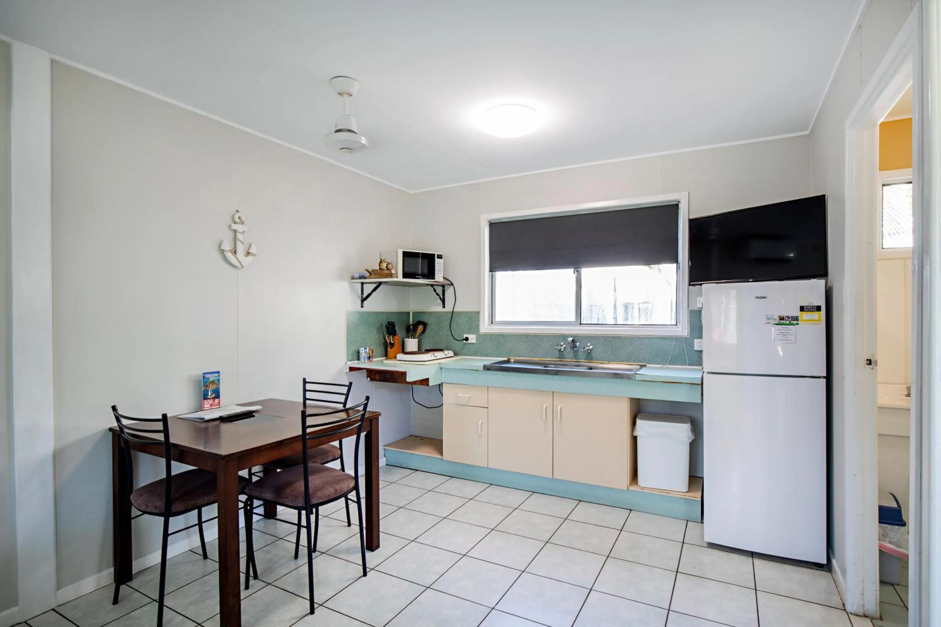 Kitchen or kitchenette in Bush Village Holiday Cabins
