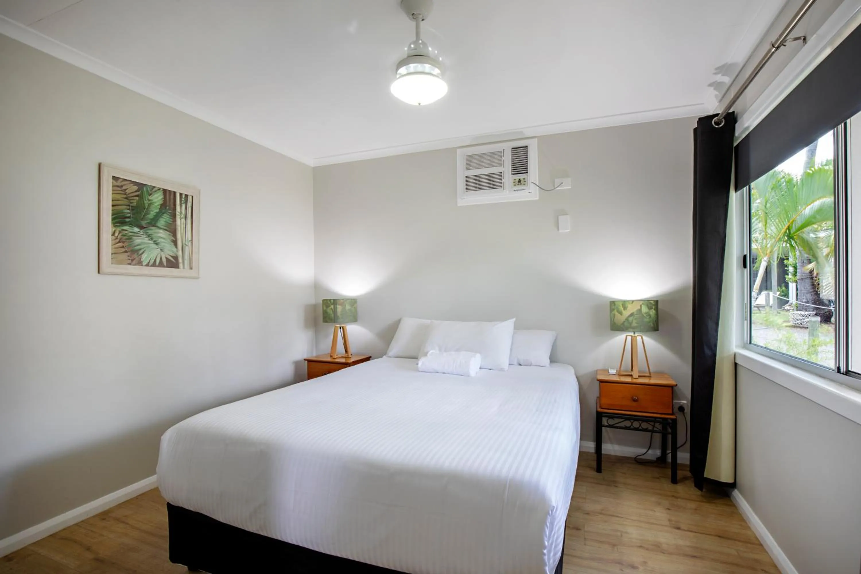 Bed in Bush Village Holiday Cabins