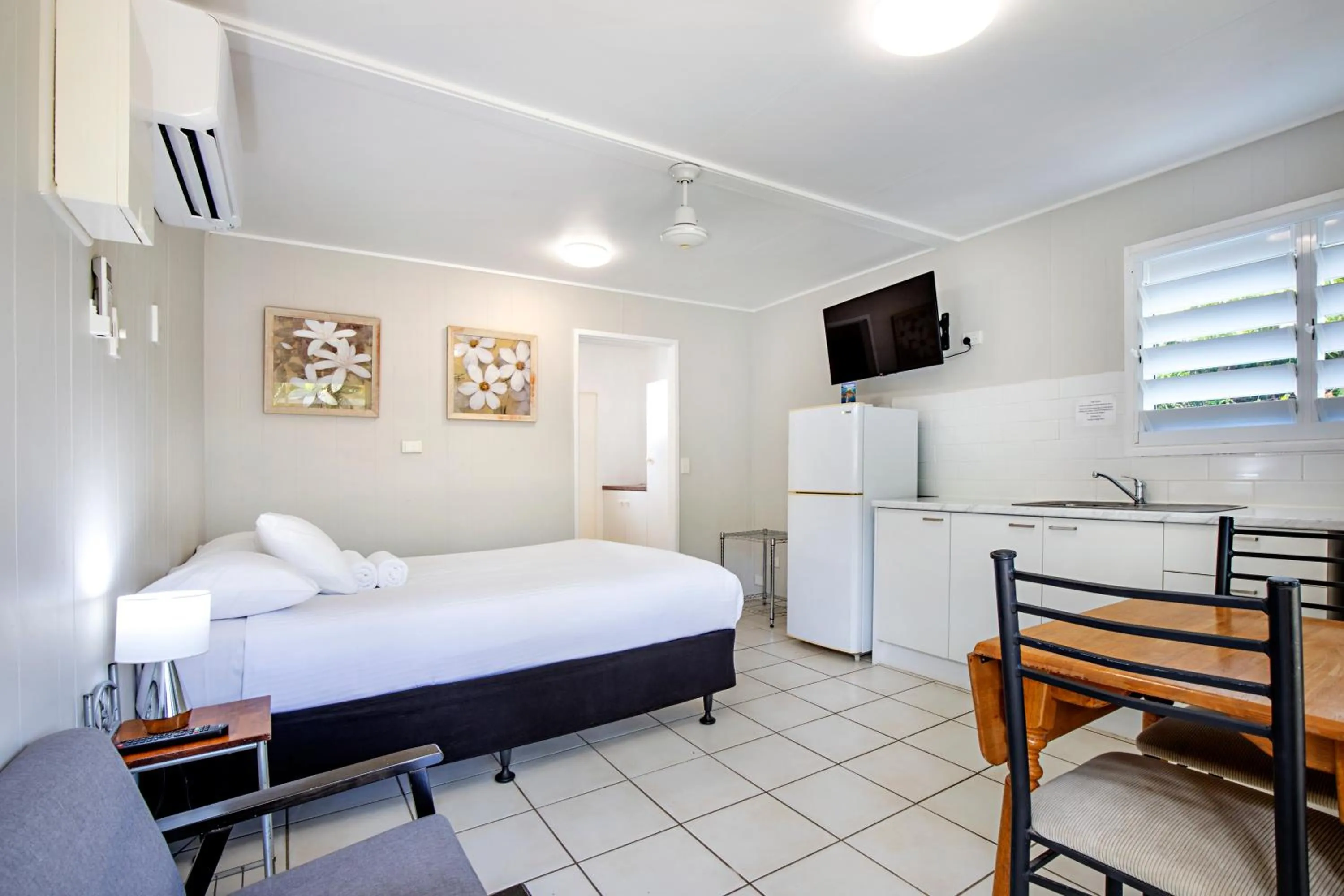 Bed in Bush Village Holiday Cabins