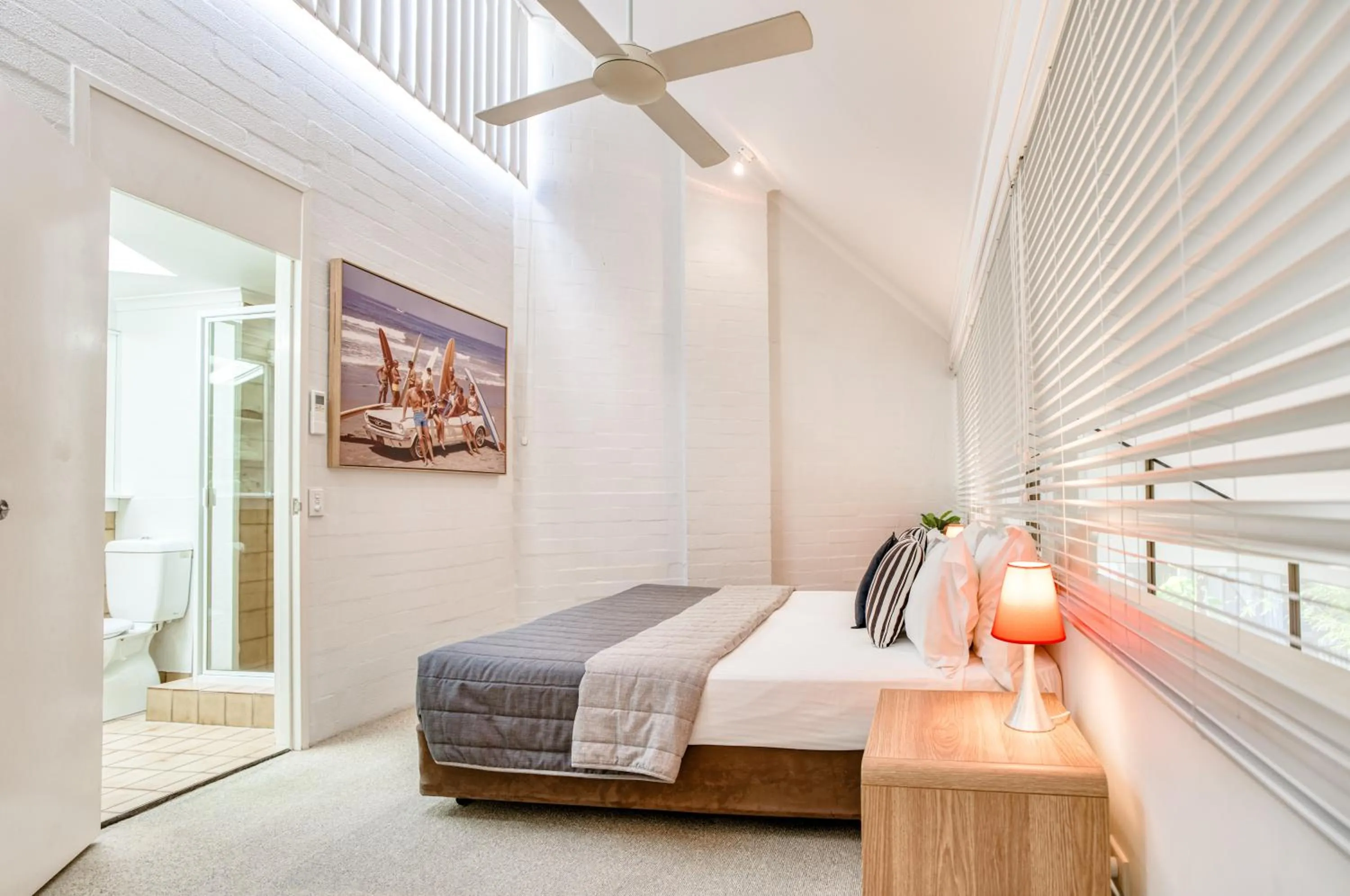 Bathroom, Bed in Ocean Breeze Resort