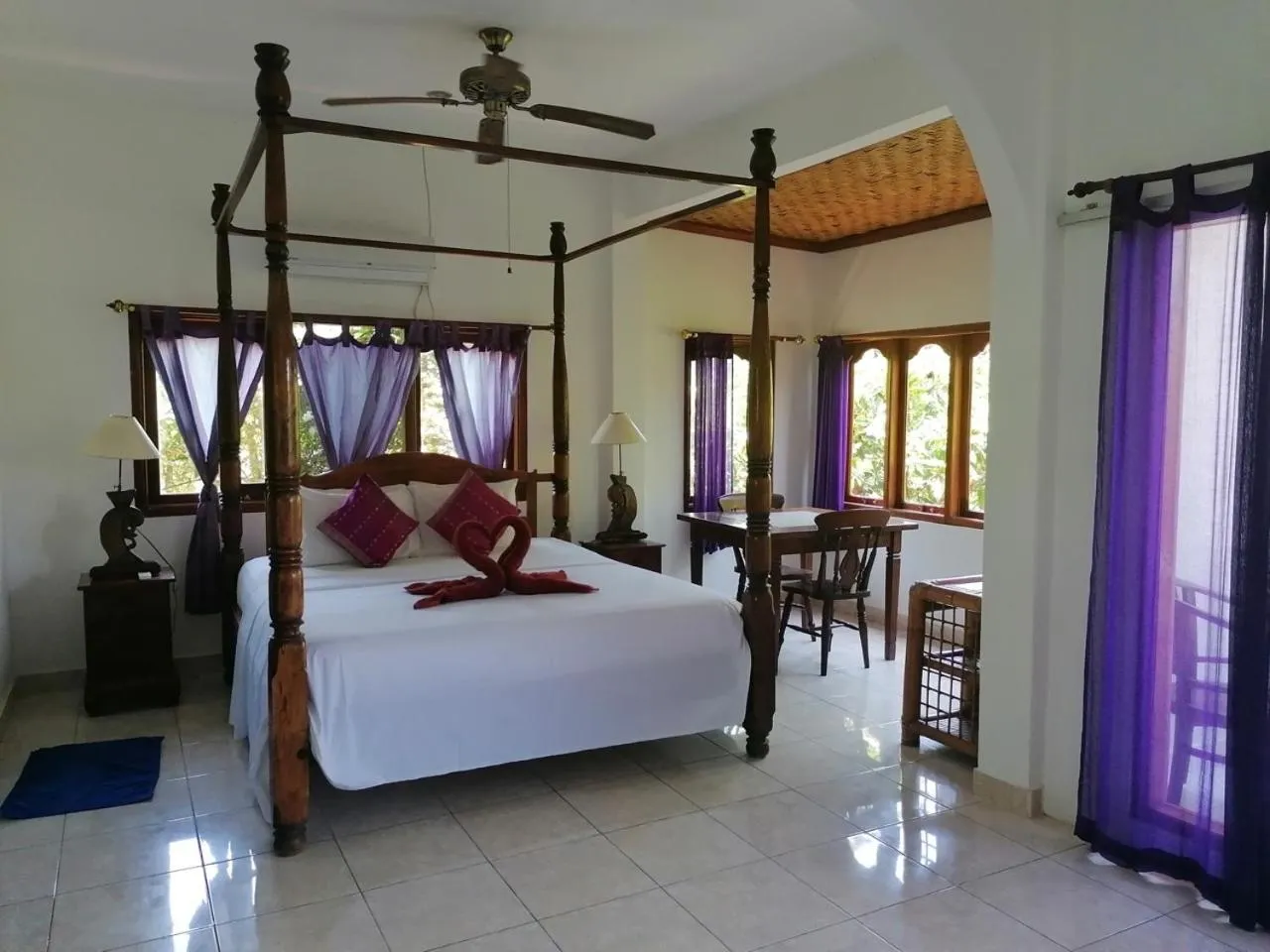 Bed in Puri Oka Beach Bungalows