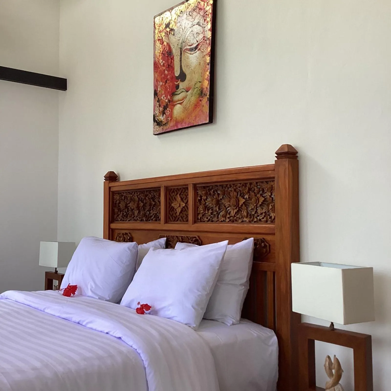 Bed in Puri Oka Beach Bungalows