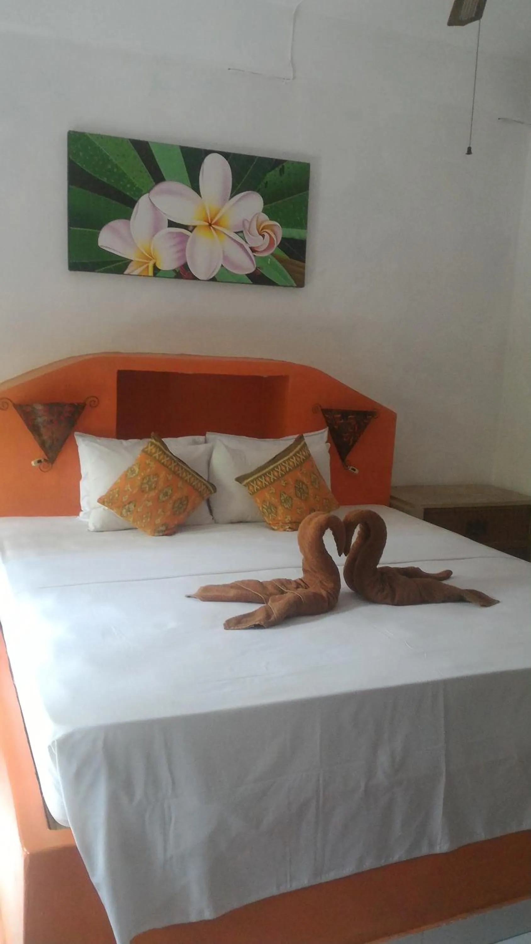Bed in Puri Oka Beach Bungalows