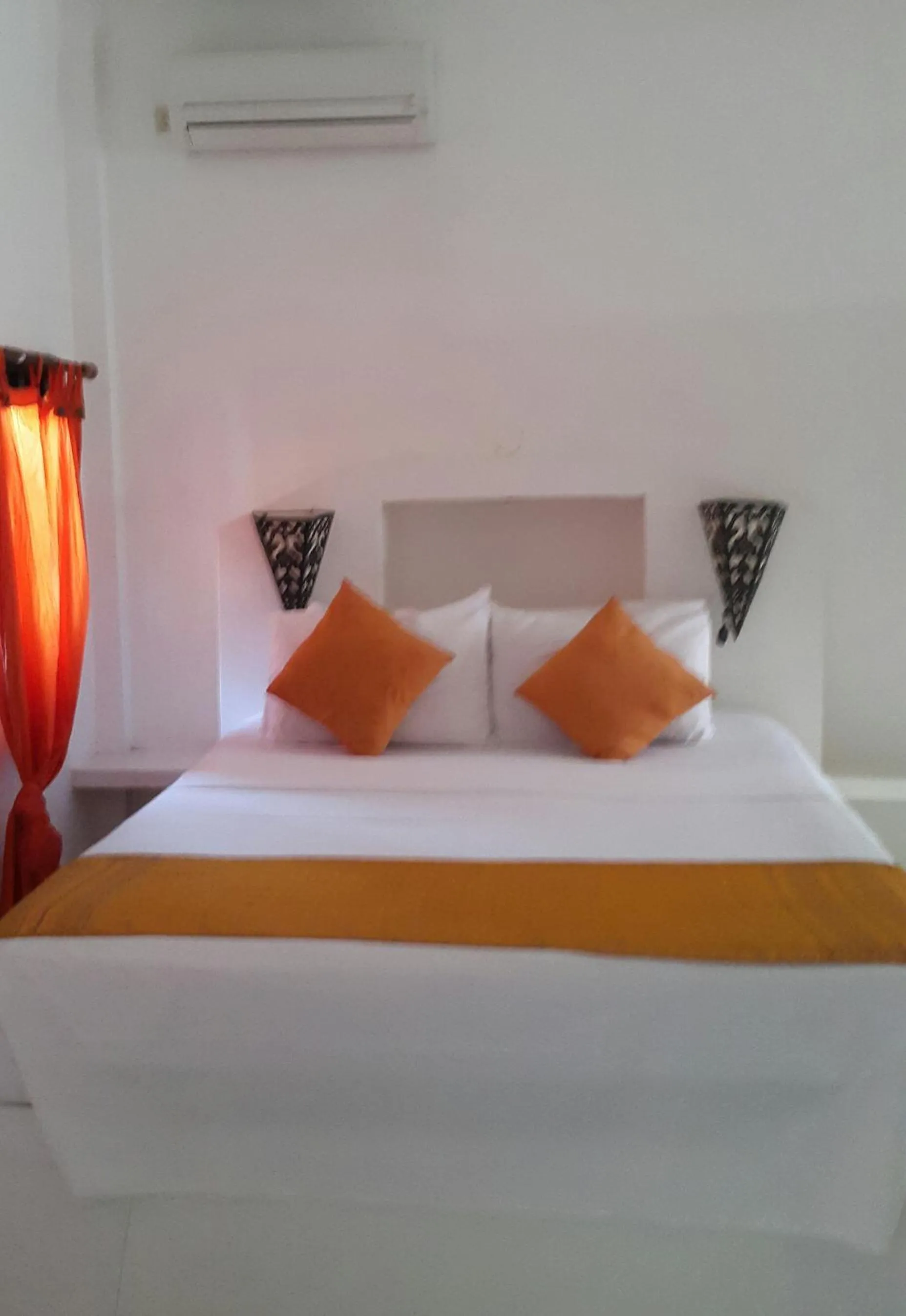 Bed in Puri Oka Beach Bungalows
