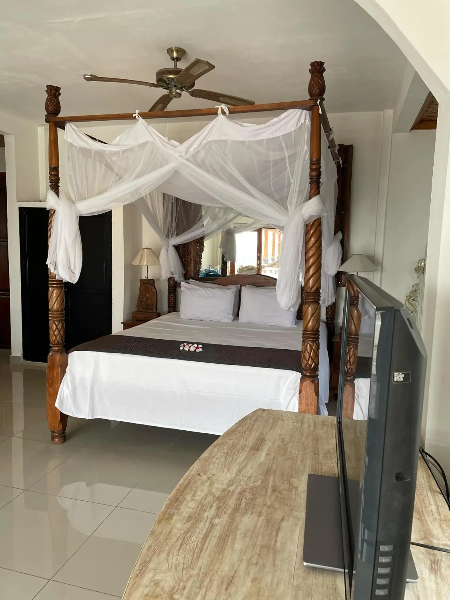Bed in Puri Oka Beach Bungalows