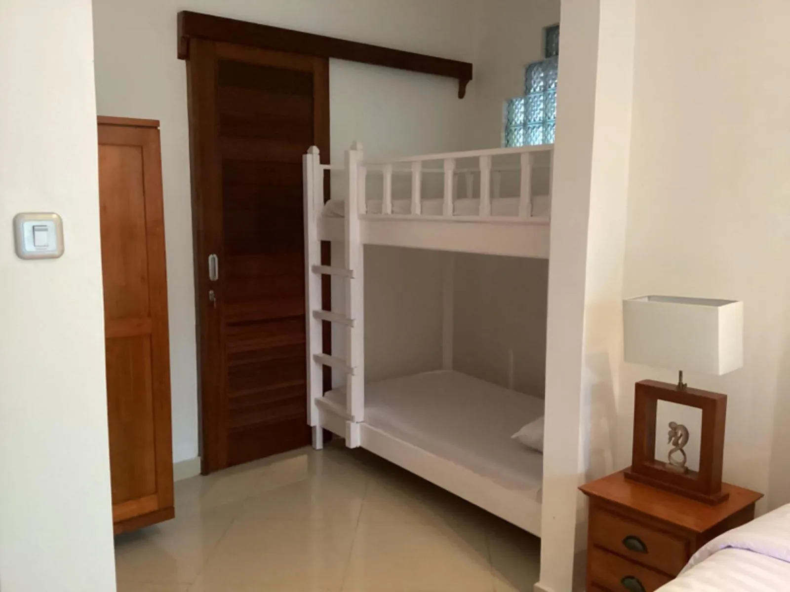 Bed in Puri Oka Beach Bungalows