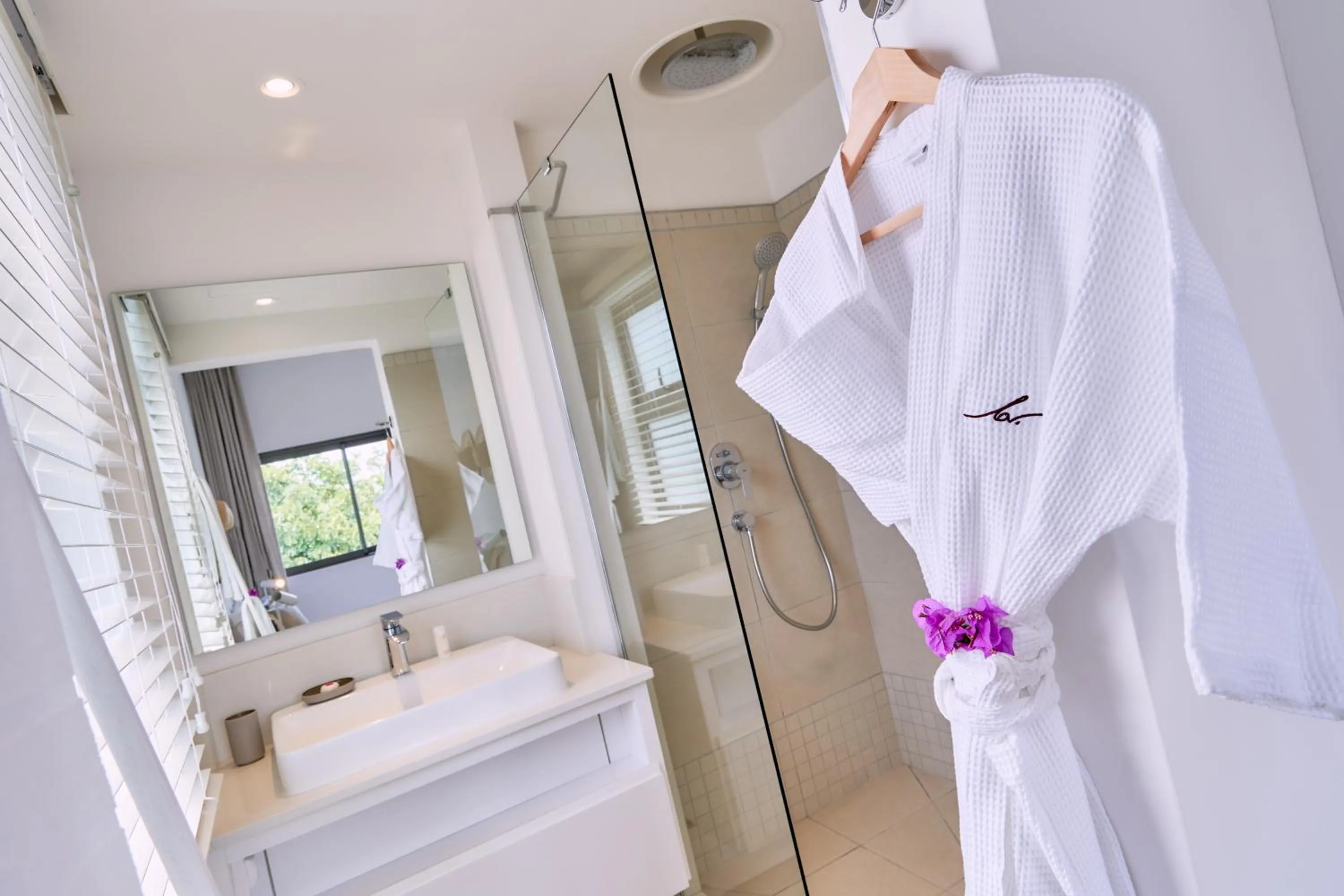 Shower in Les Estivales Beachfront Suites & Penthouses by LOV Mauritius